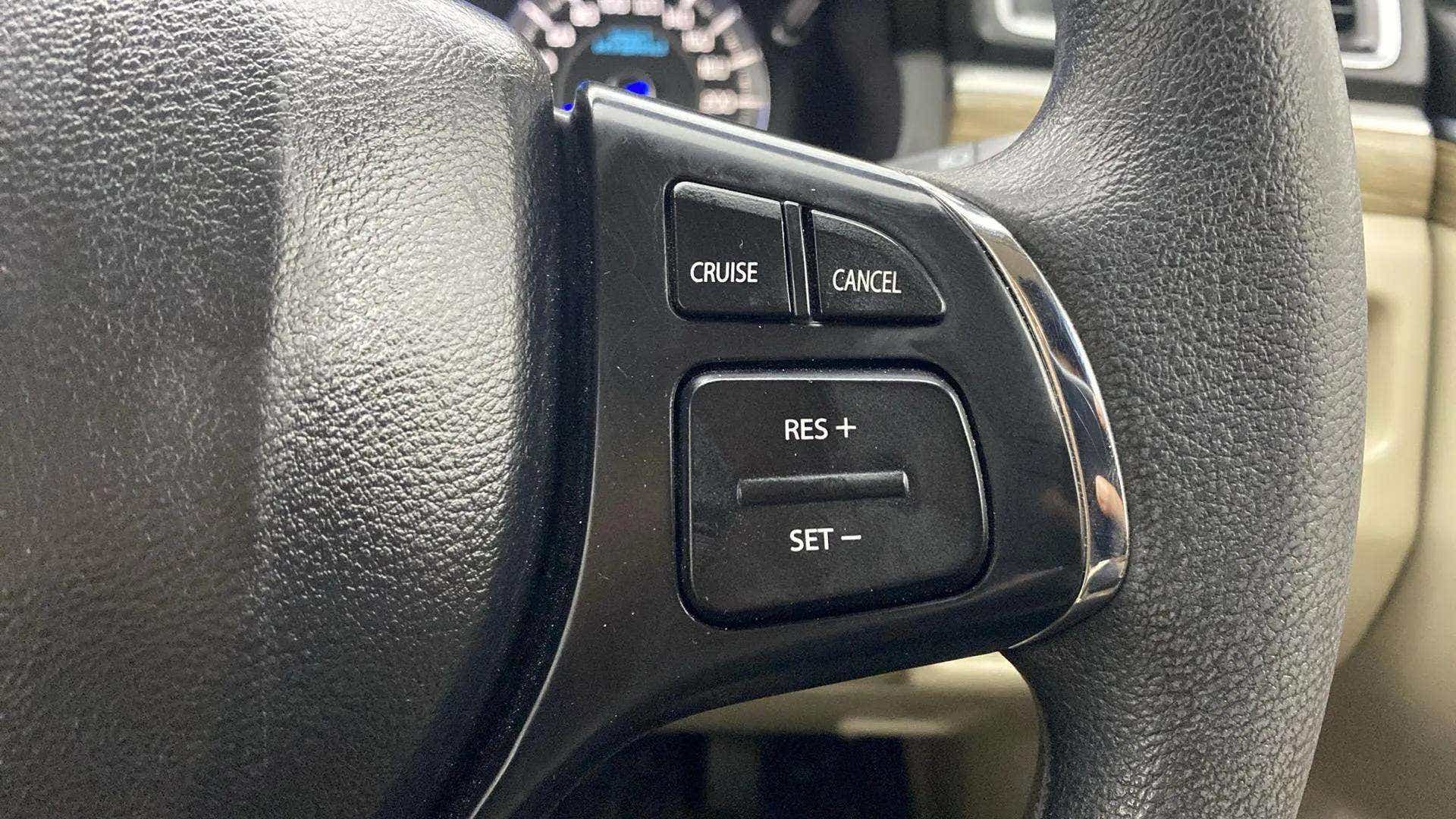 Steering wheel cruise control buttons of a Maruti Suzuki Ciaz