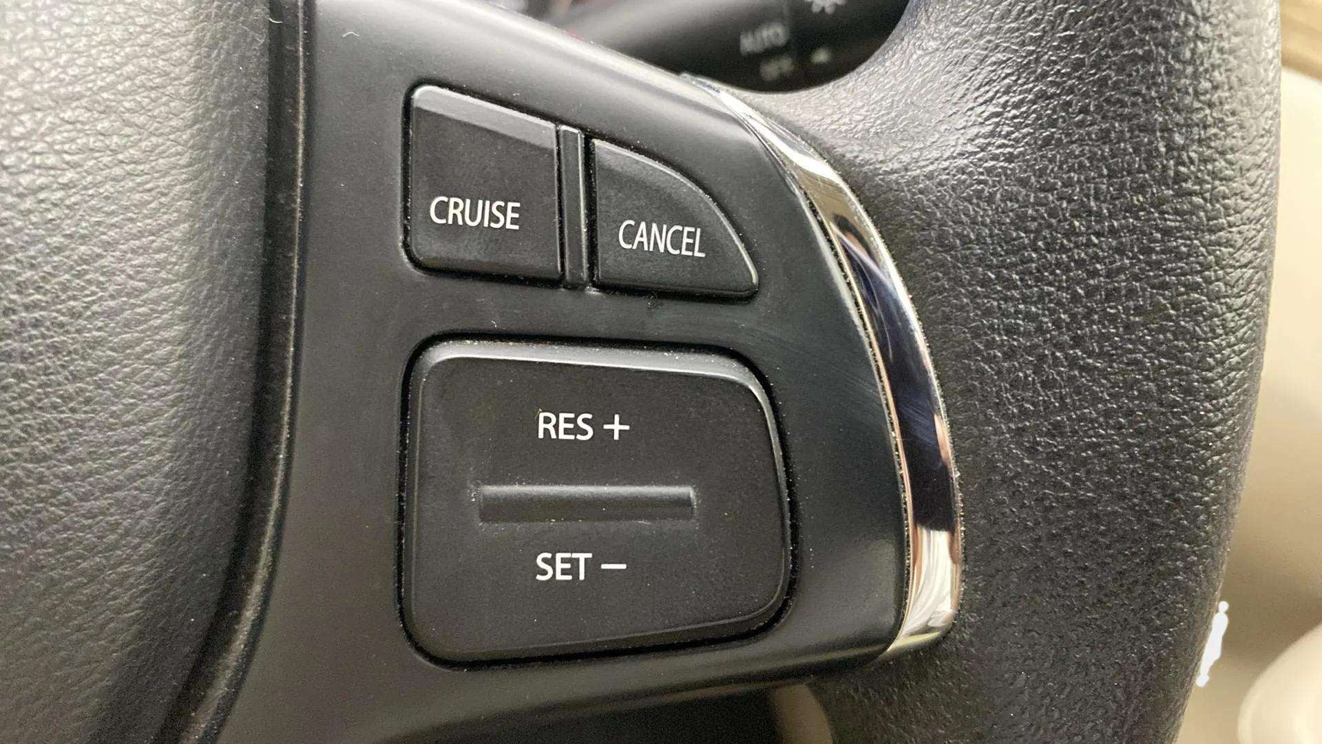Cruise control buttons on a Maruti Suzuki Ciaz steering wheel