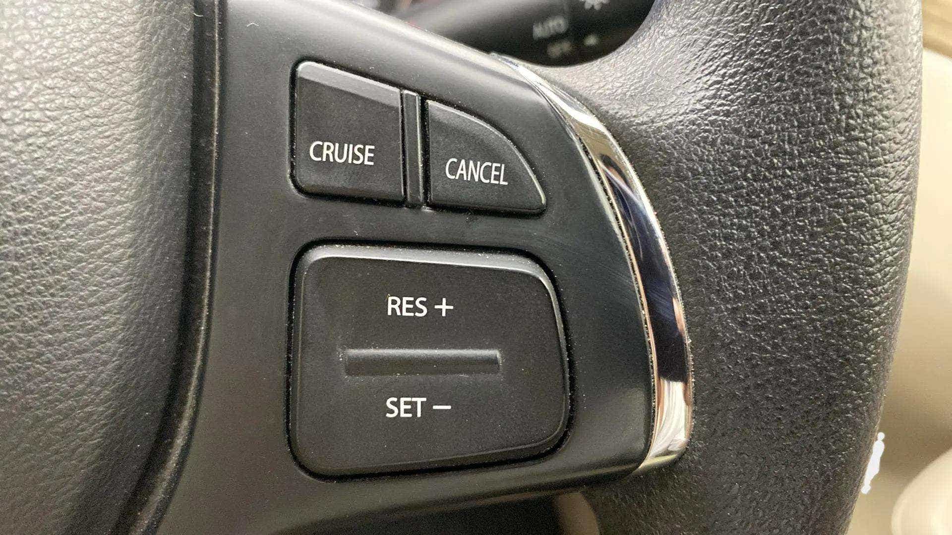 Cruise control buttons on a Maruti Suzuki Ciaz steering wheel