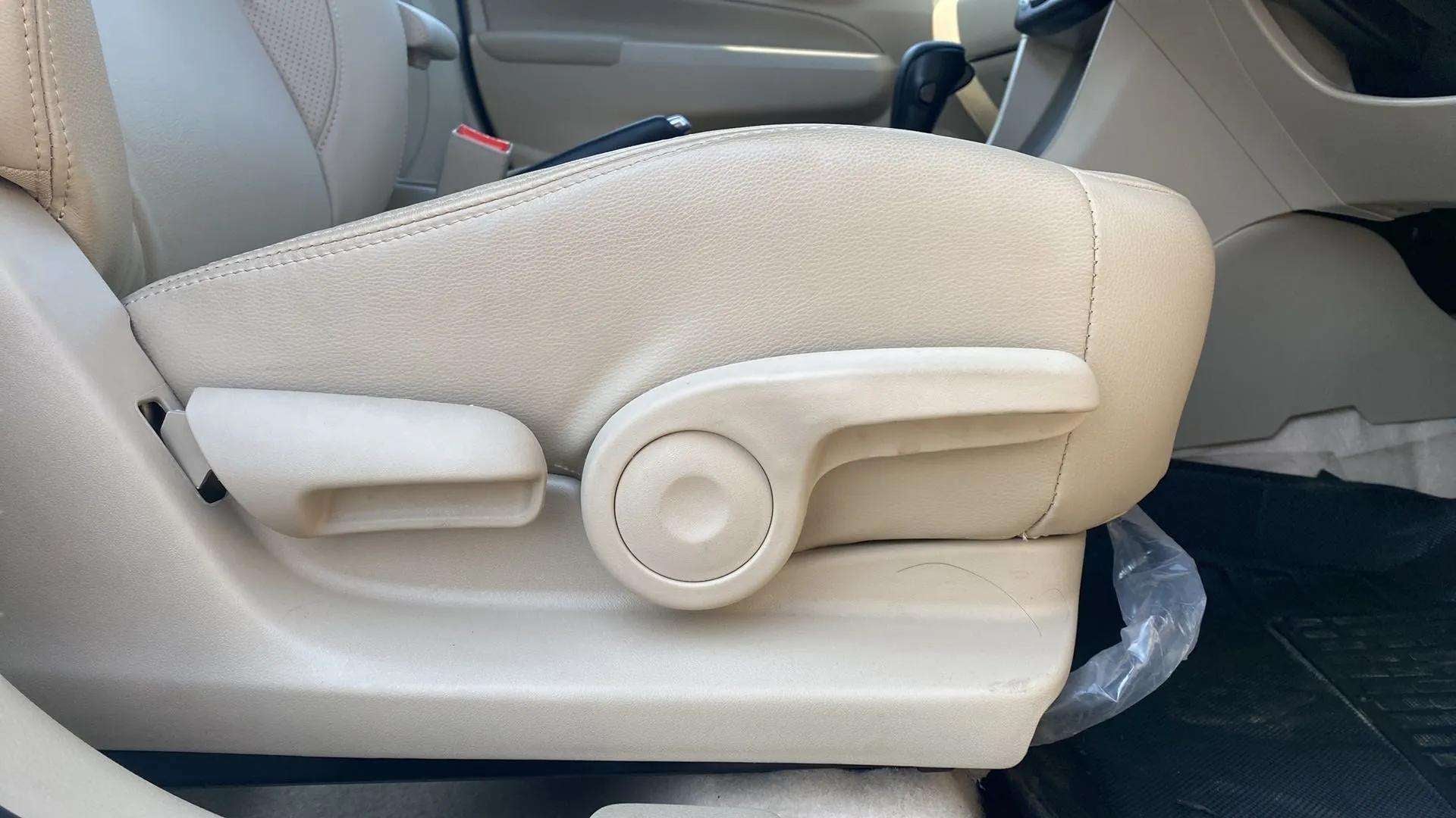 Front seat adjustment controls of a Maruti Suzuki Ciaz
