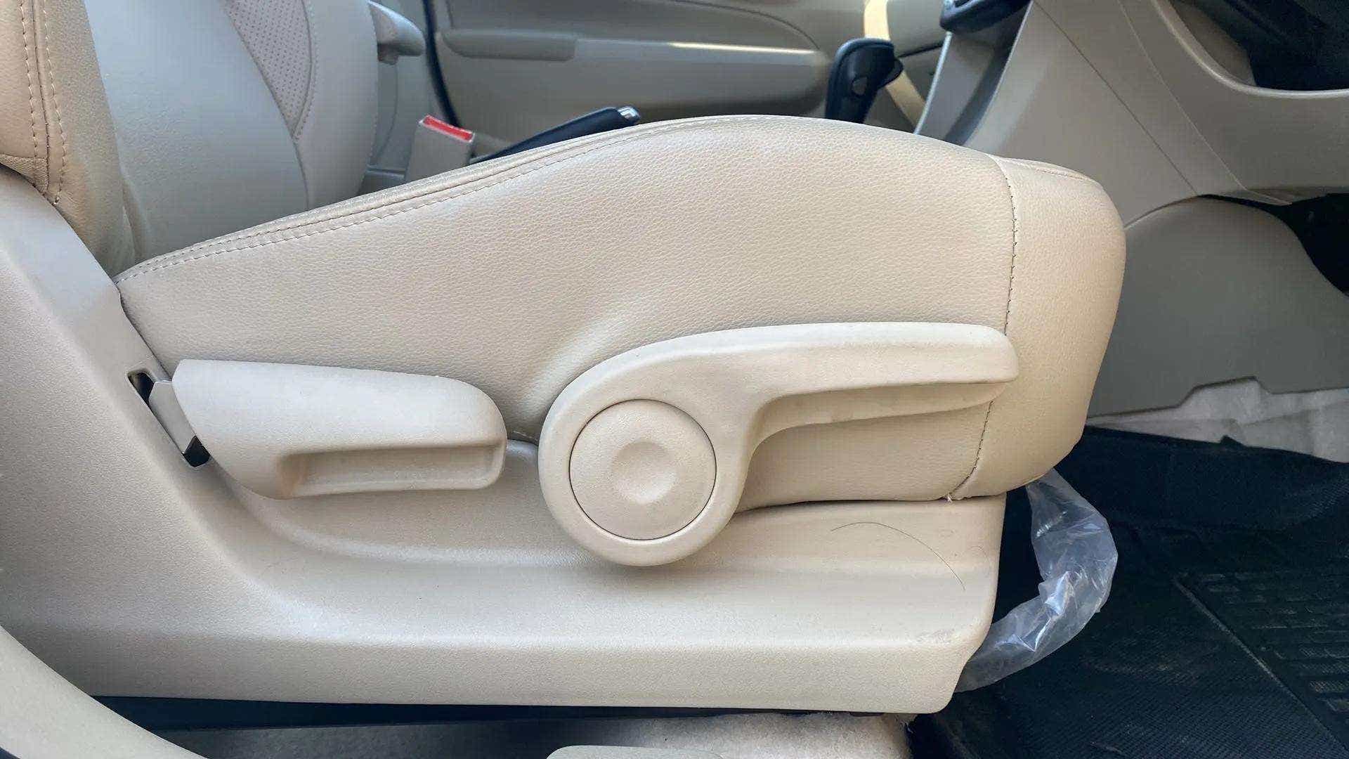 Front seat adjustment controls of a Maruti Suzuki Ciaz