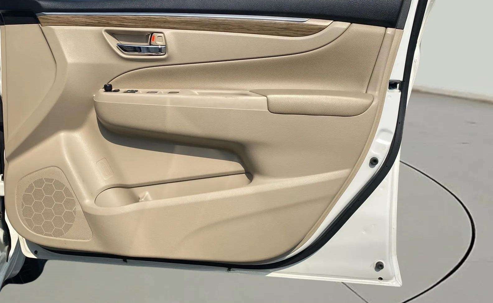 Interior door panel of a Maruti Suzuki Ciaz