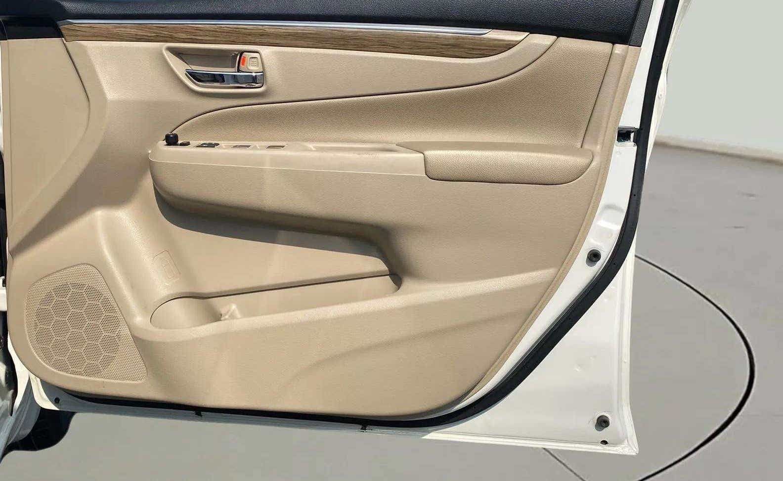 Interior door panel of a Maruti Suzuki Ciaz