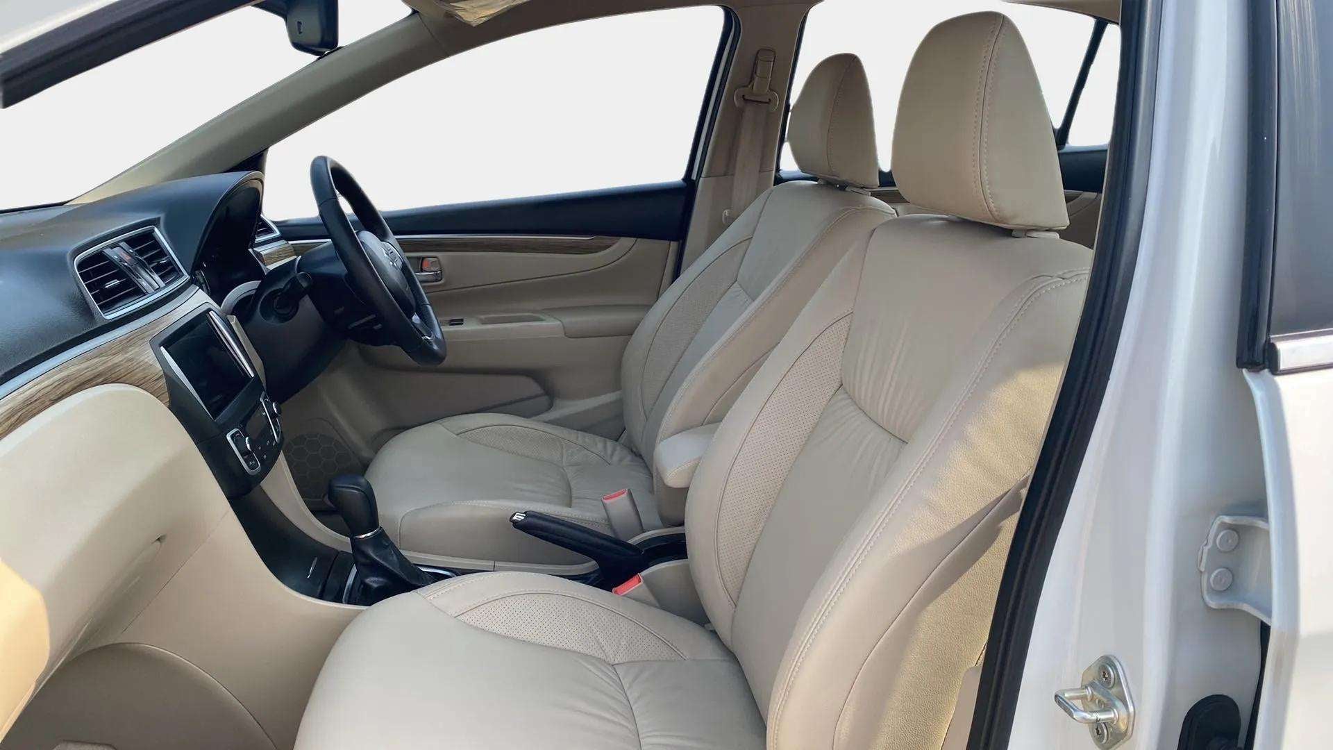 Interior front seats and dashboard of a Maruti Suzuki Ciaz