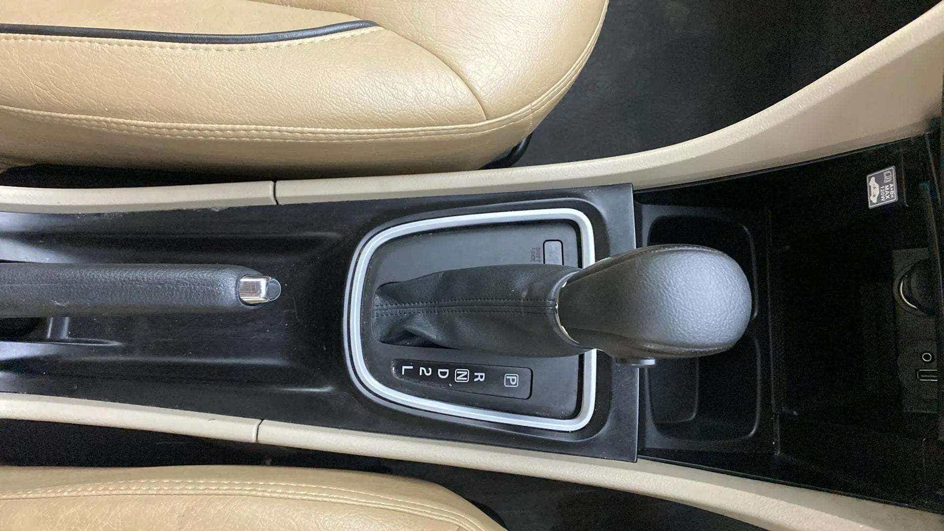 Center console and gear shifter of a Maruti Suzuki Ciaz