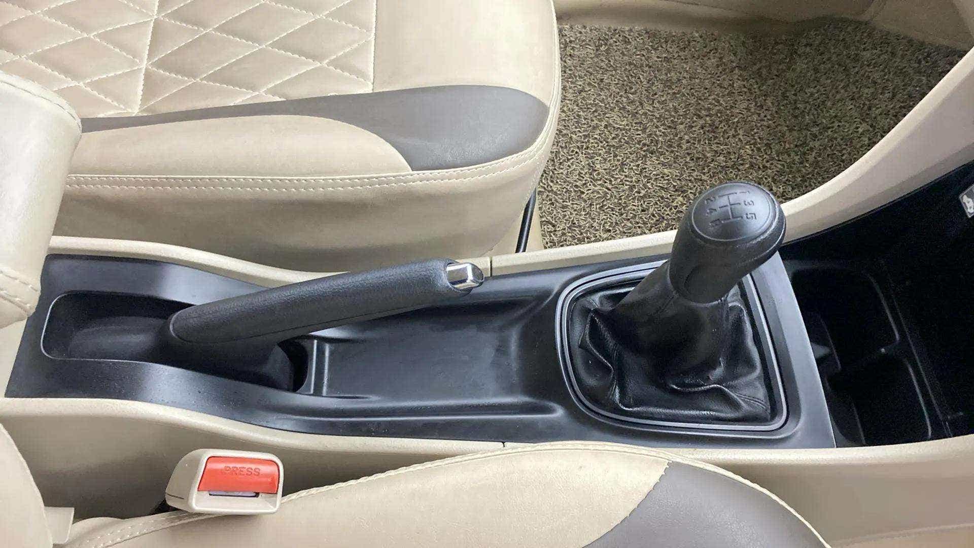 Center console with gear lever and handbrake of a Maruti Suzuki Ciaz