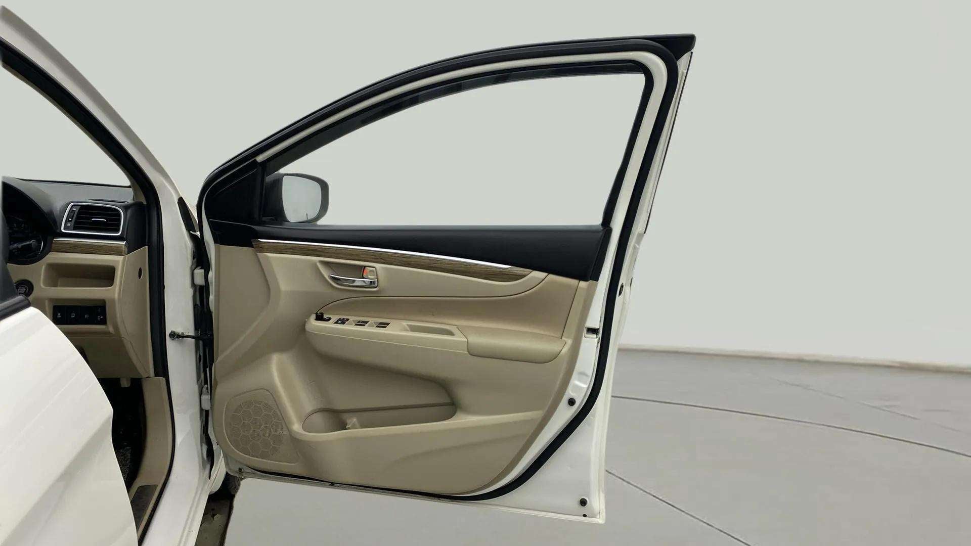 Driver side door interior of a Maruti Suzuki Ciaz