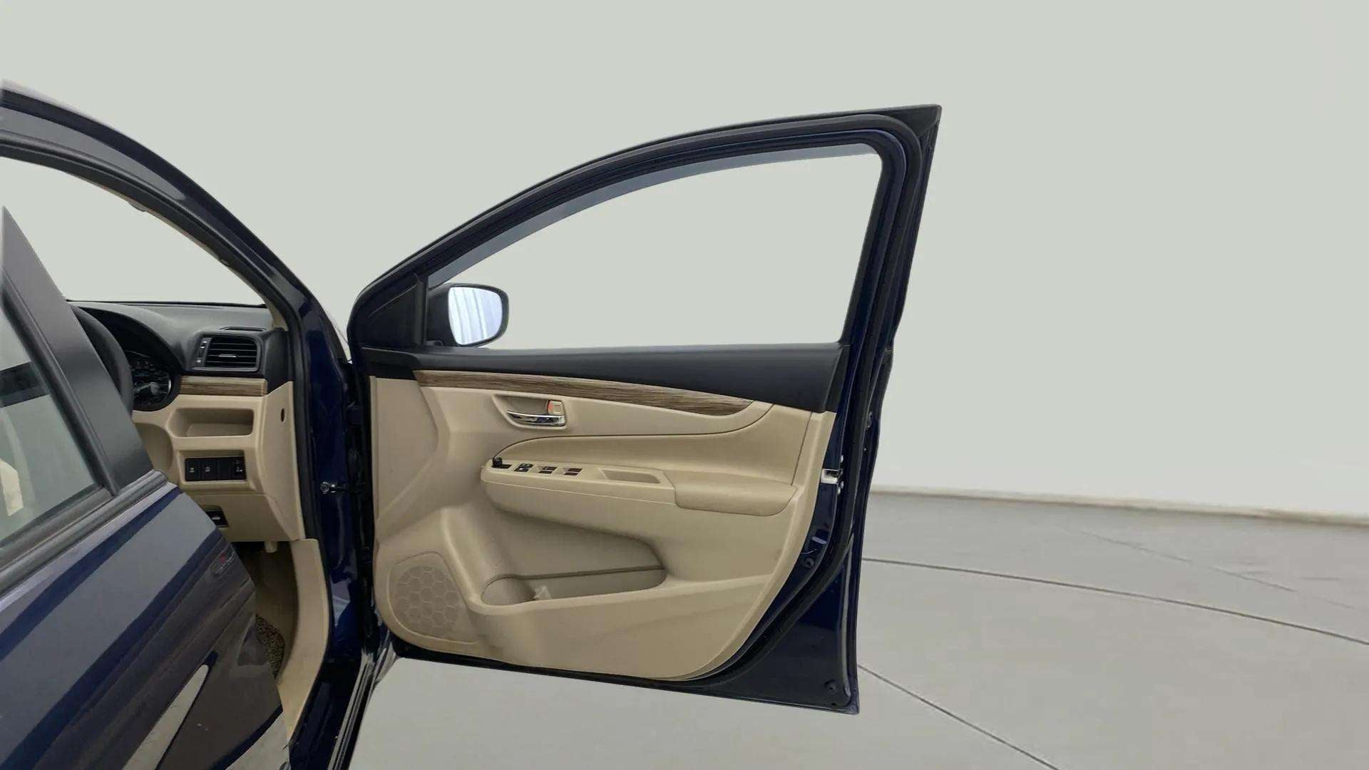 Front driver side door interior of a Maruti Suzuki Ciaz