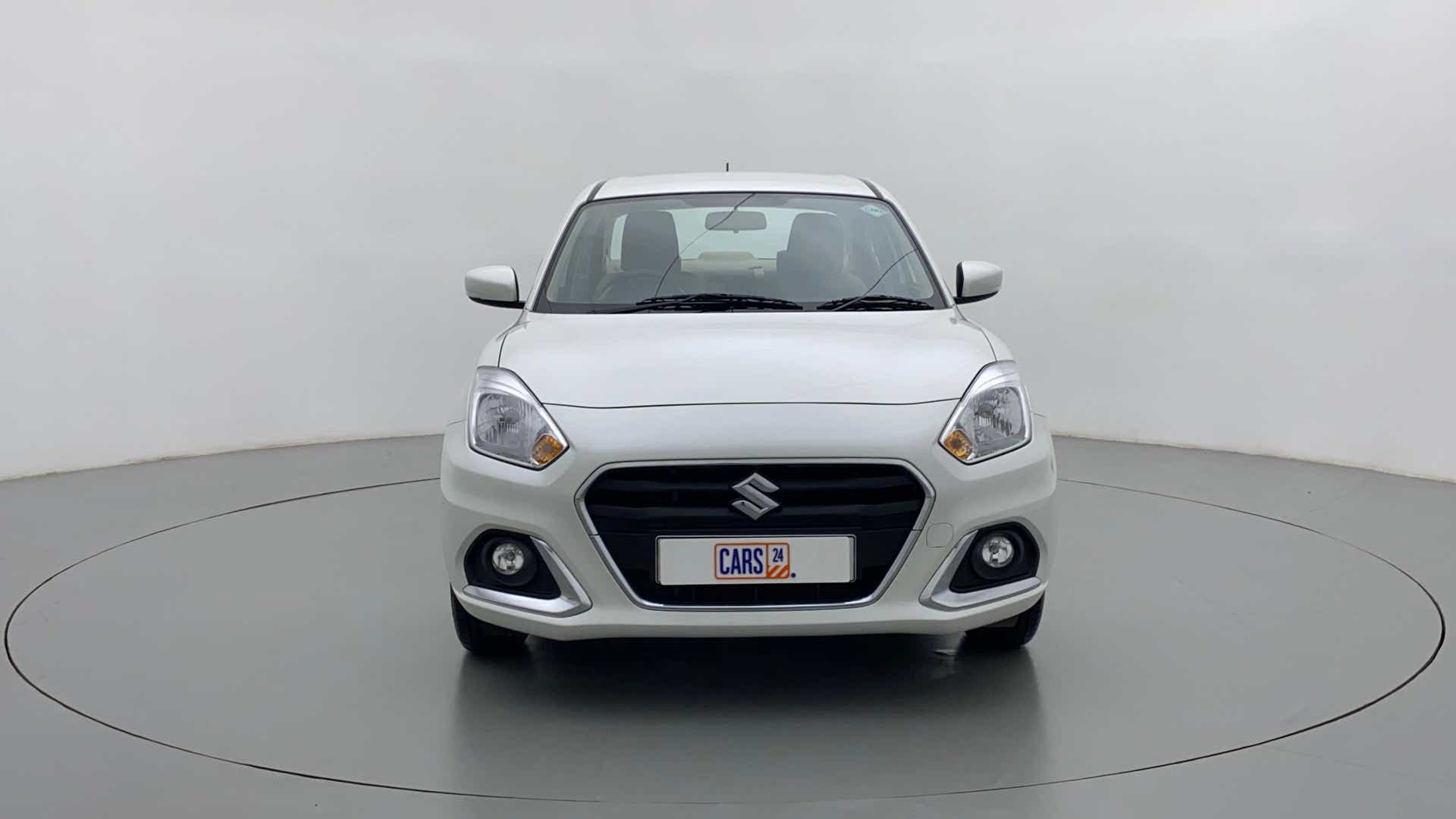 Front view of a arctic white Maruti Suzuki Dzire 2018-2023