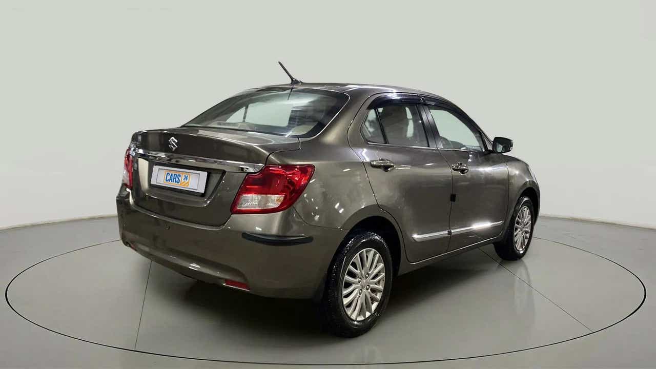 Rear three-quarter view of a Maruti Suzuki Dzire 2018-2023