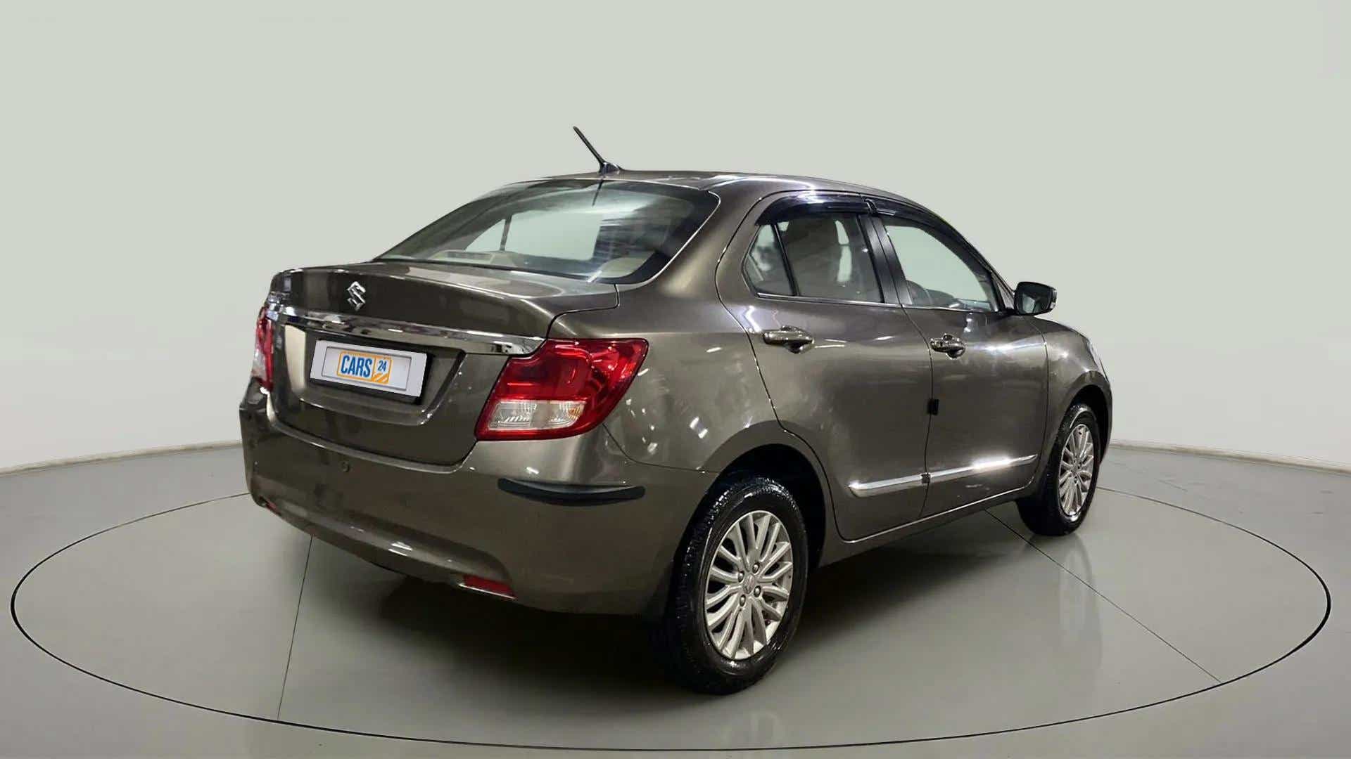 Rear three-quarter view of a Maruti Suzuki Dzire 2018-2023