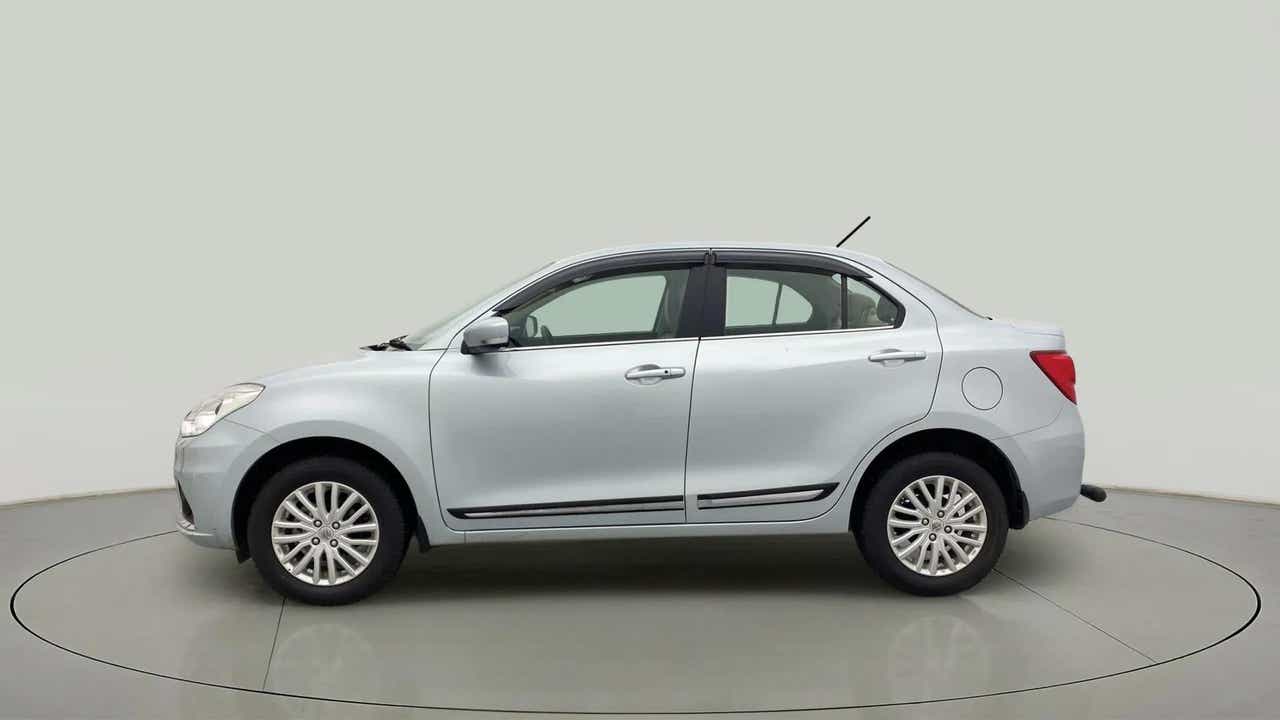 Side view of a splendid silver Maruti Suzuki Dzire