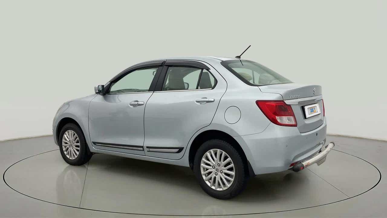 Rear three-quarter view of a Maruti Suzuki Dzire