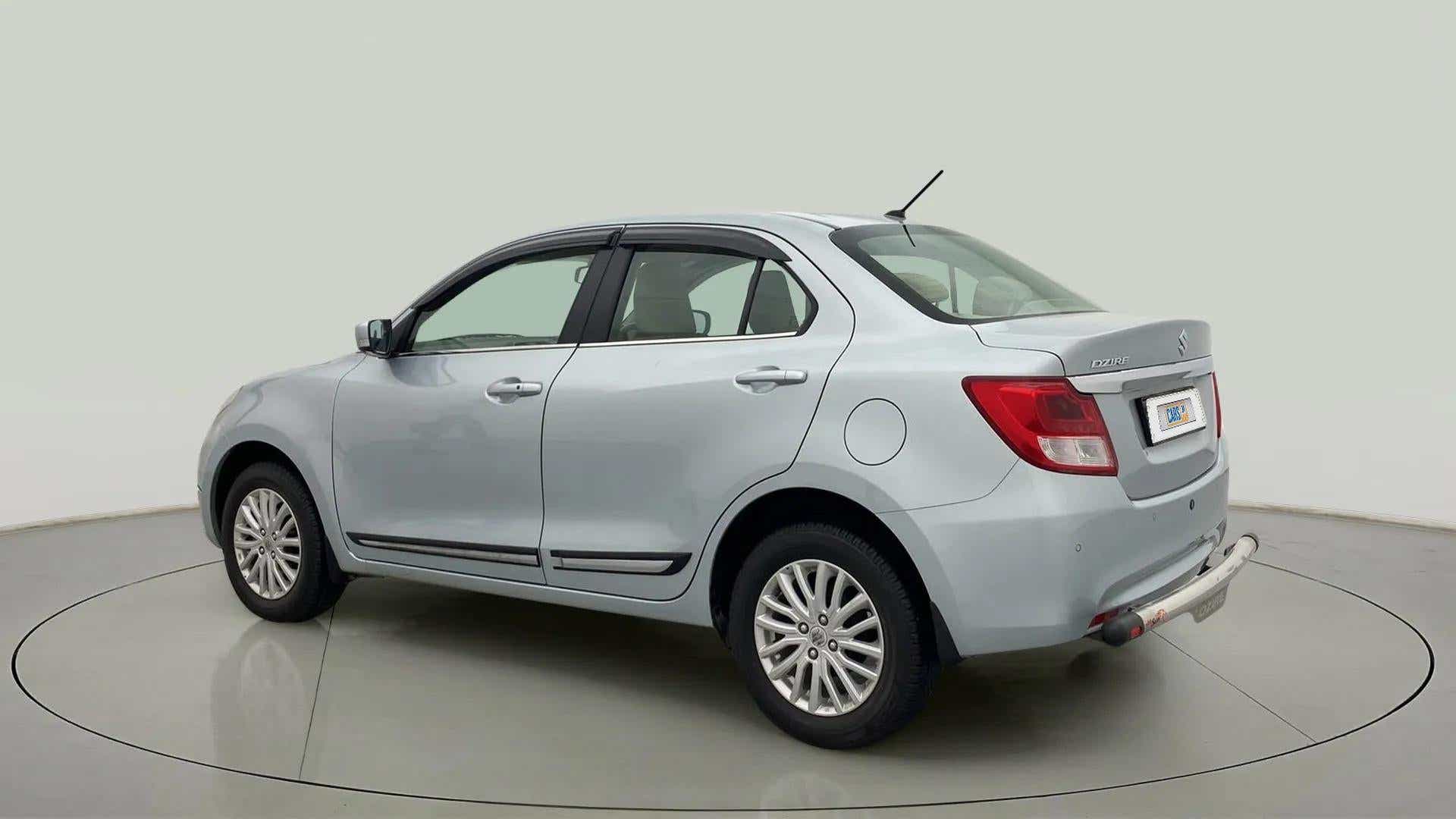 Rear three-quarter view of a Maruti Suzuki Dzire