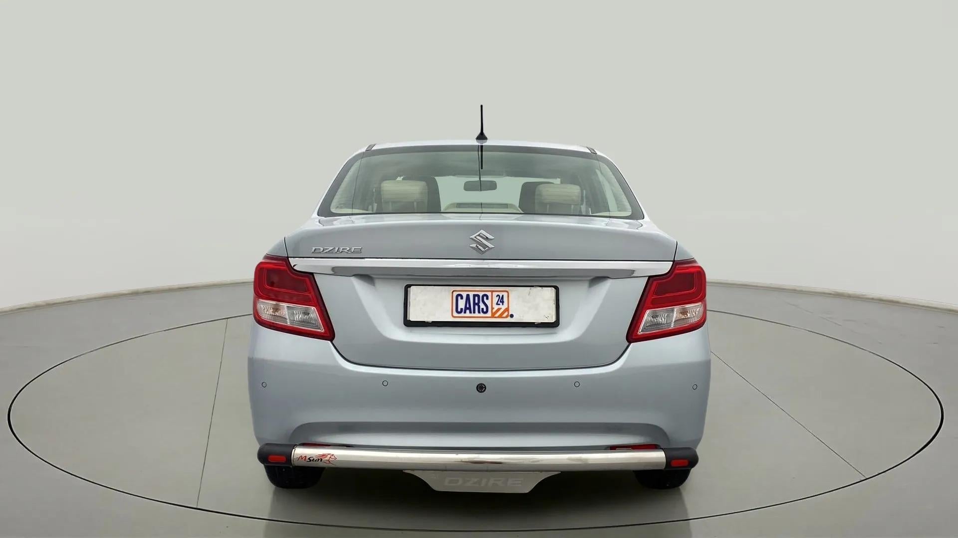 Rear view of a splendid silver Maruti Suzuki Dzire