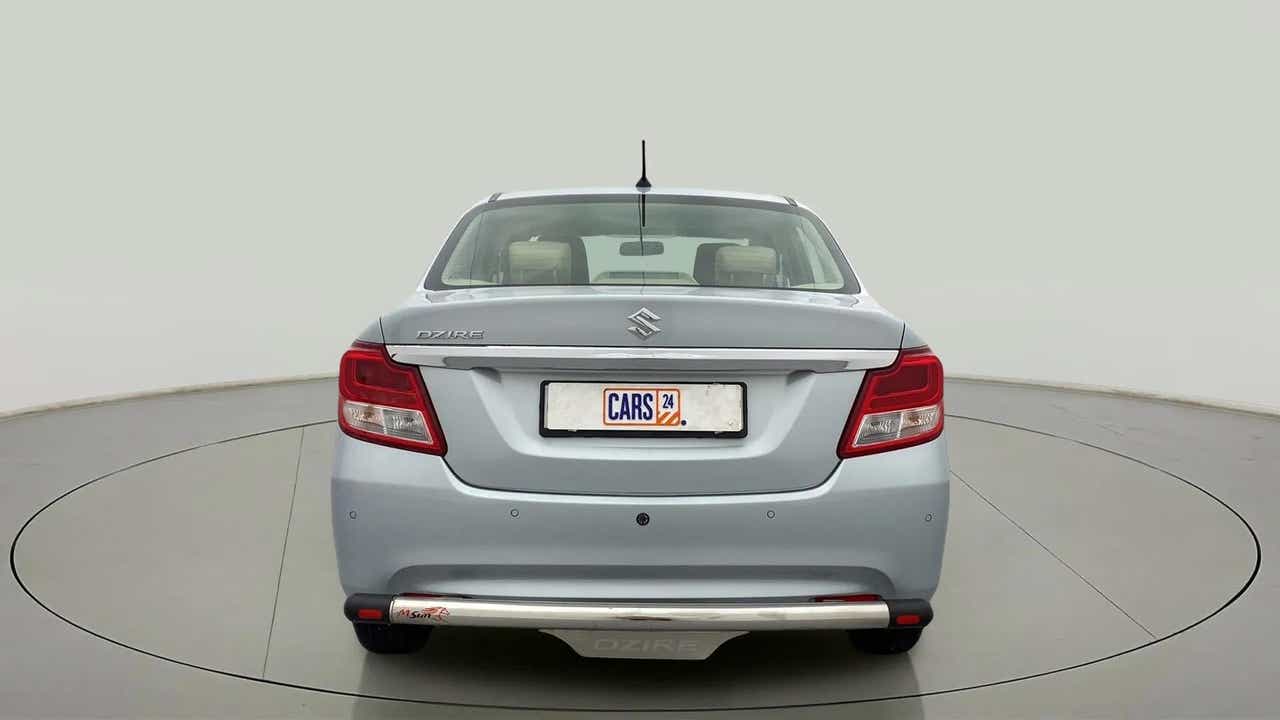 Rear view of a splendid silver Maruti Suzuki Dzire