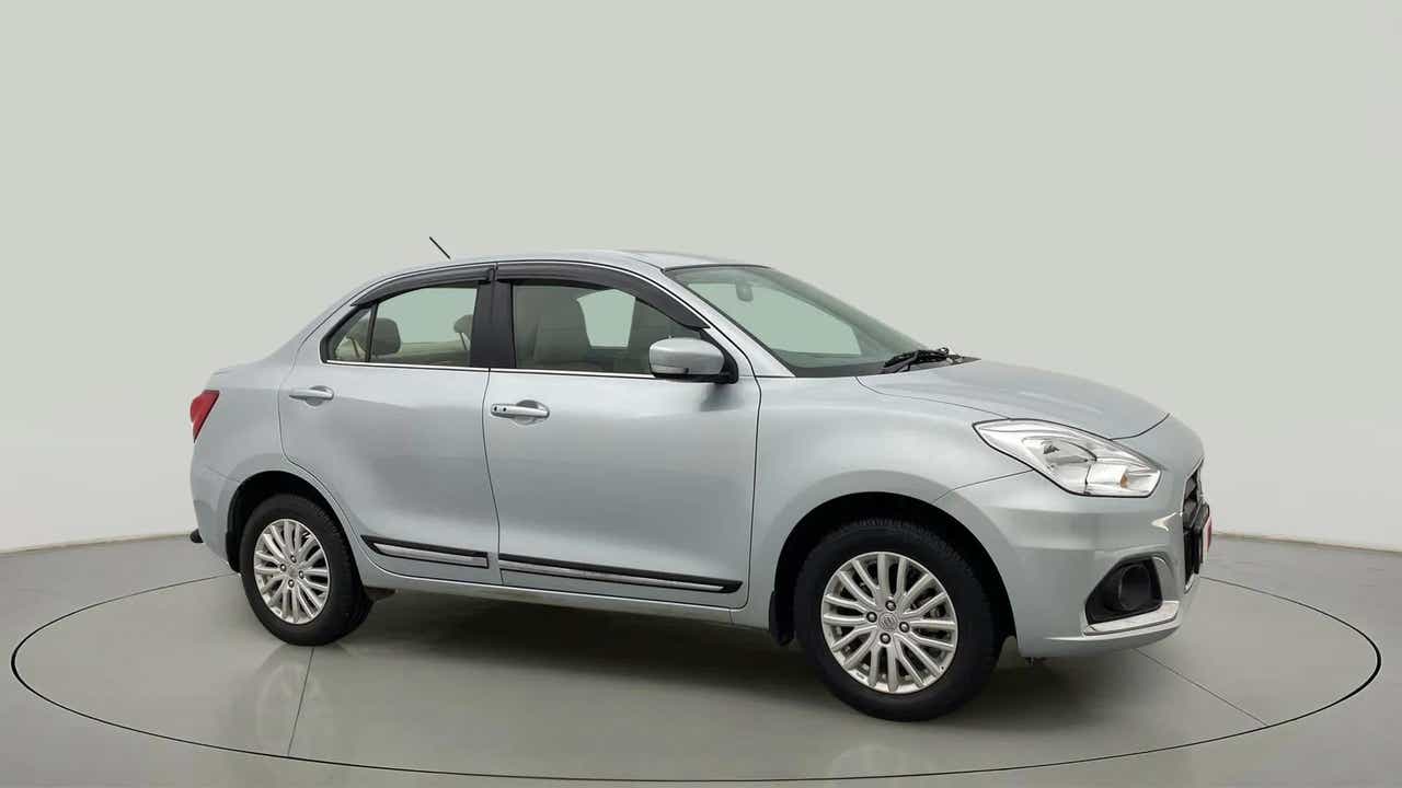 Side view of a splendid silver Maruti Suzuki Dzire