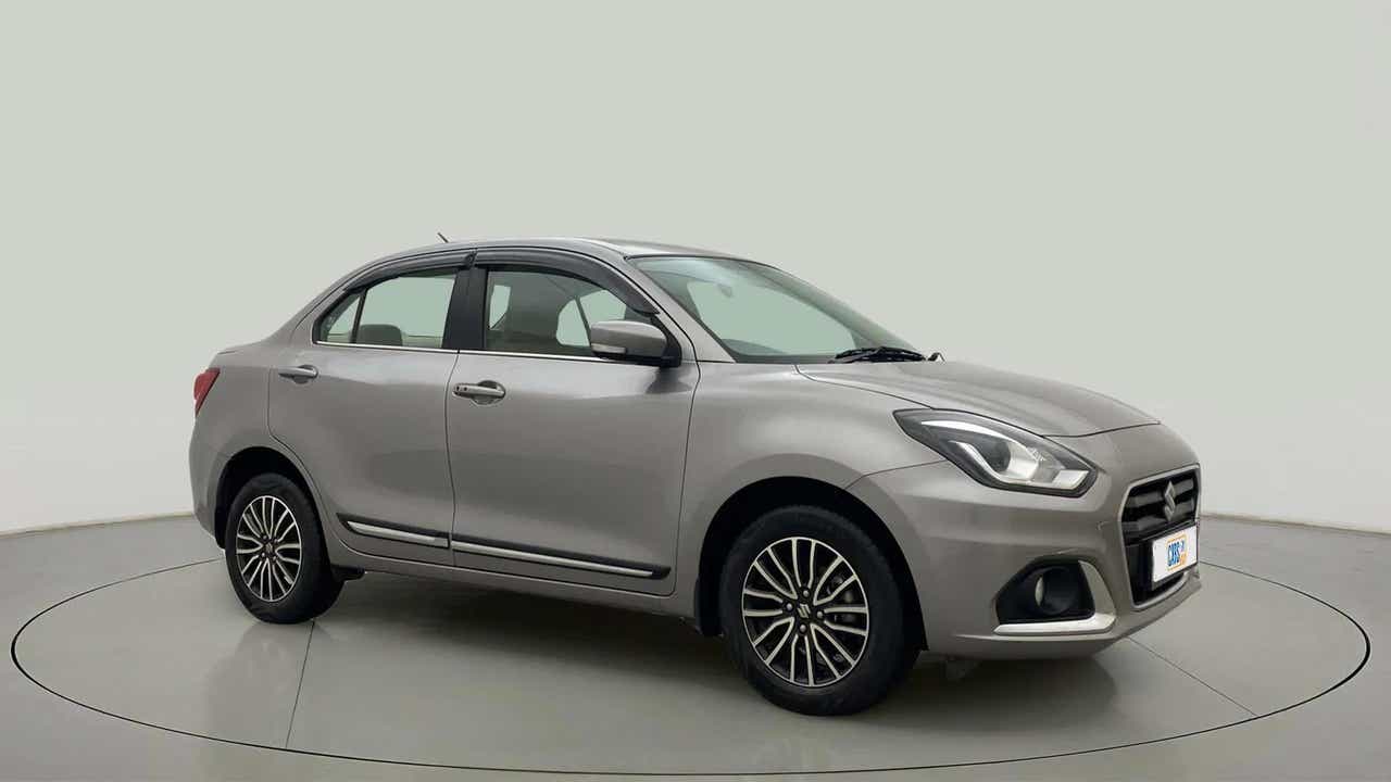 Front three-quarter view of a splendid silver Maruti Suzuki Dzire 2018-2023