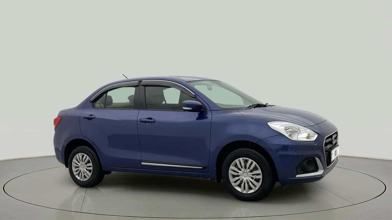 Side view of a oxford blue Maruti Suzuki Dzire 2018-2023