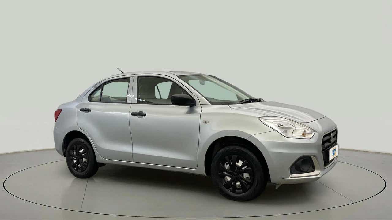 Side view of a splendid silver Maruti Suzuki Dzire 2018-2023