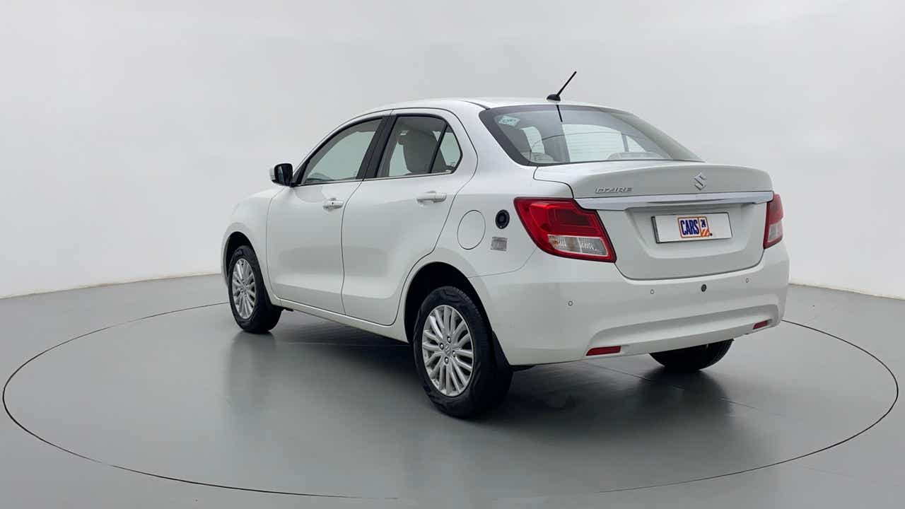 Rear three-quarter view of a Arctic White Maruti Suzuki Dzire 2018-2023