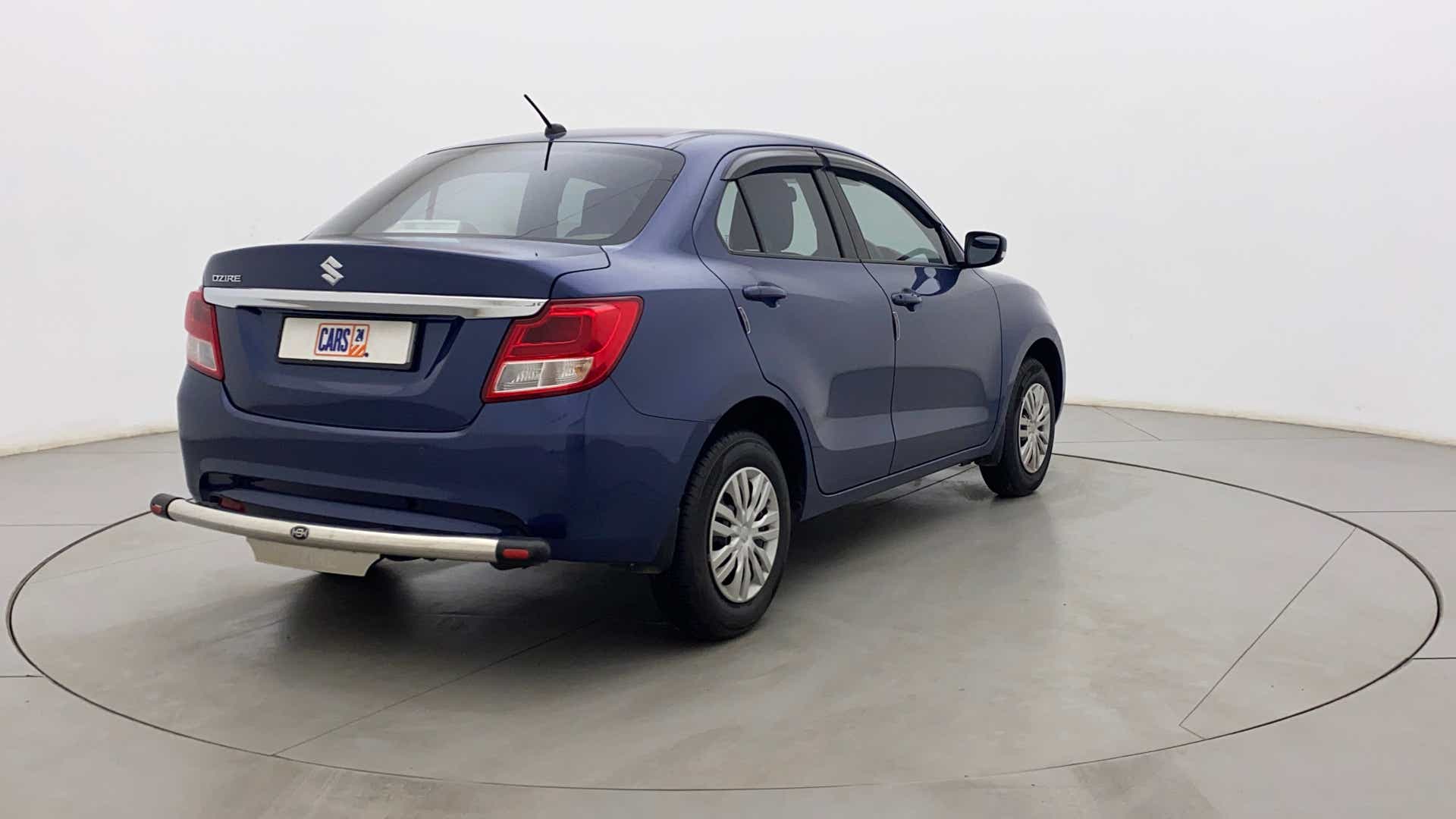 Rear three-quarter view of a Maruti Suzuki Dzire 2018-2023