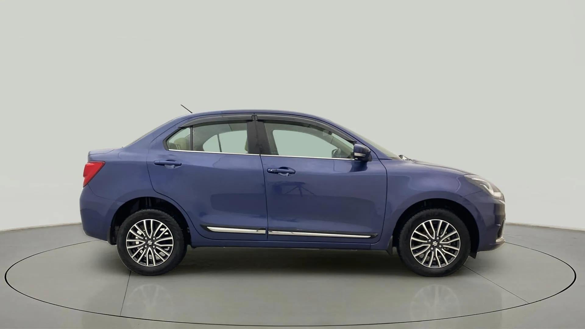 Side view of a Alluring Blue Maruti Suzuki Dzire