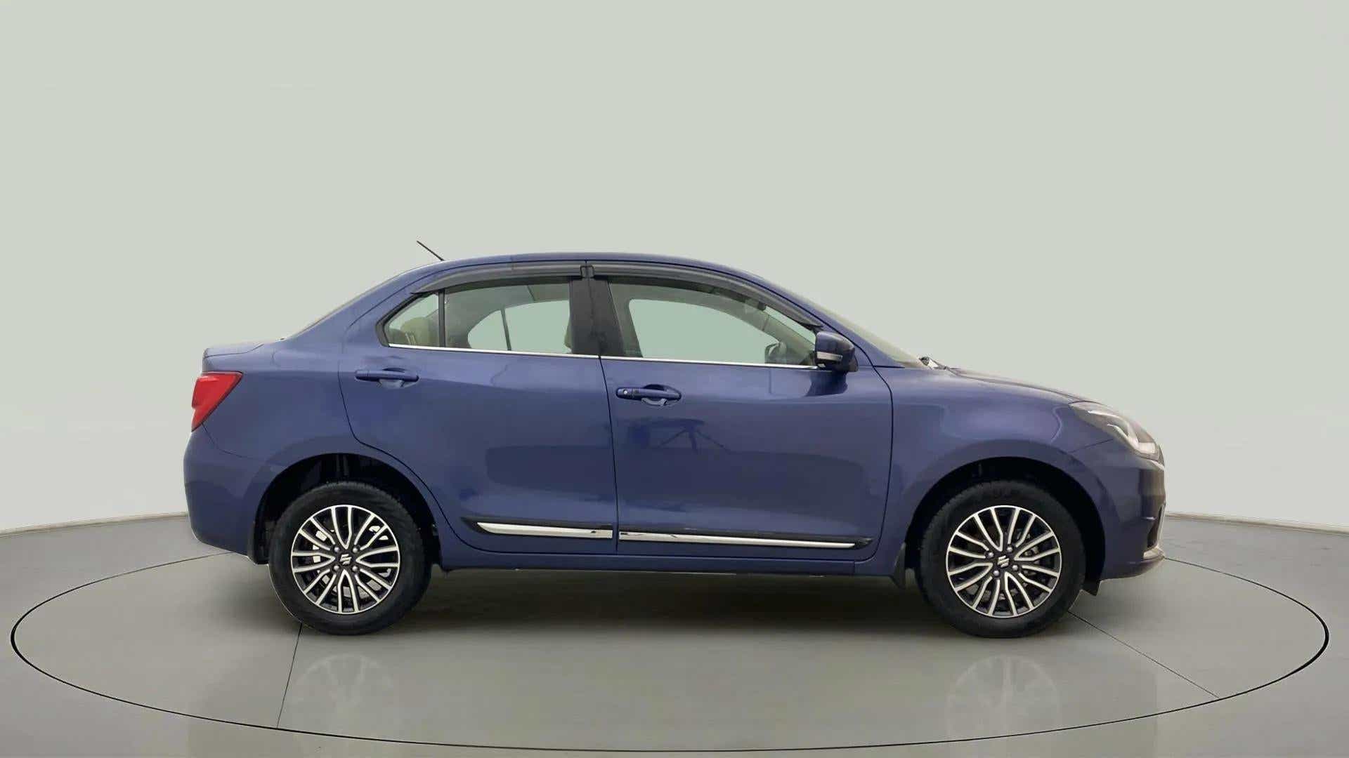 Side view of a Alluring Blue Maruti Suzuki Dzire
