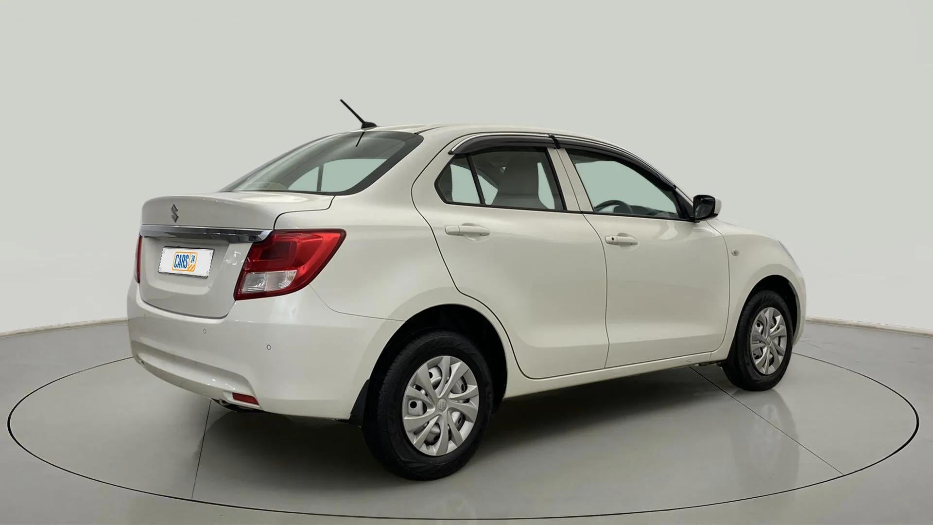 Rear three-quarter view of a Maruti Suzuki Dzire