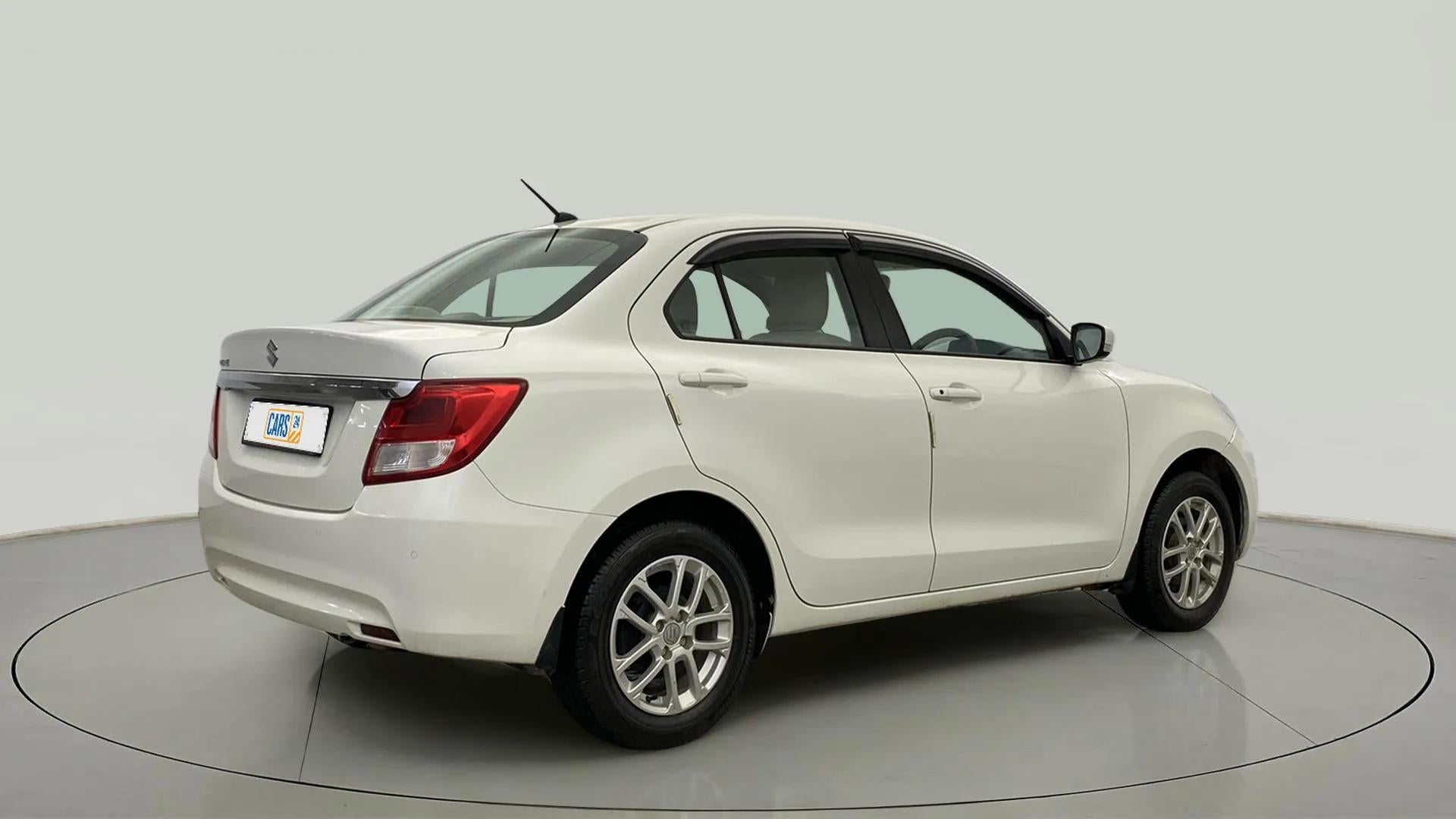 Rear three-quarter view of a Maruti Suzuki Dzire