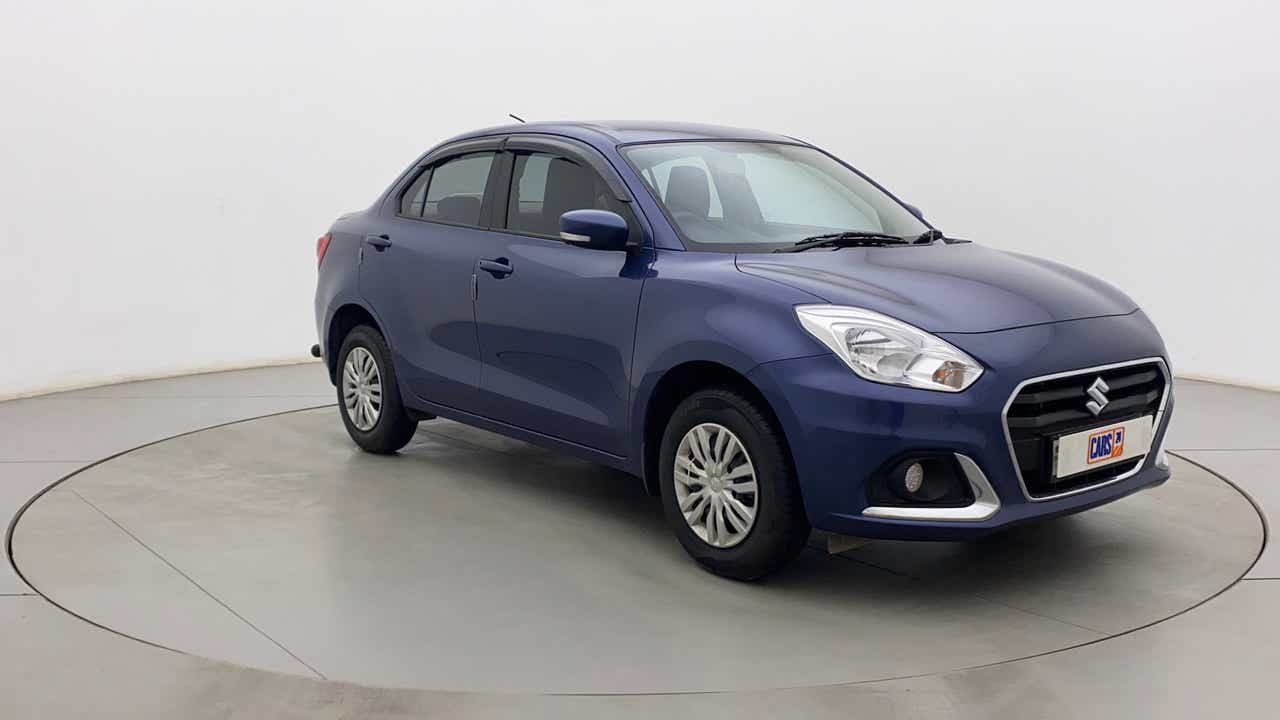 Front three-quarter view of a Oxford Blue Maruti Suzuki Dzire 2018-2023