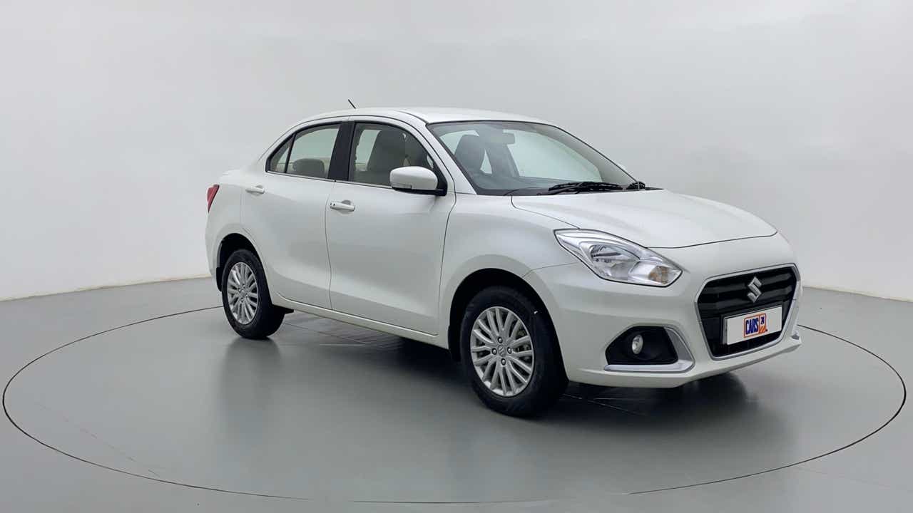 Front three-quarter view of a Arctic White Maruti Suzuki Dzire 2018-2023