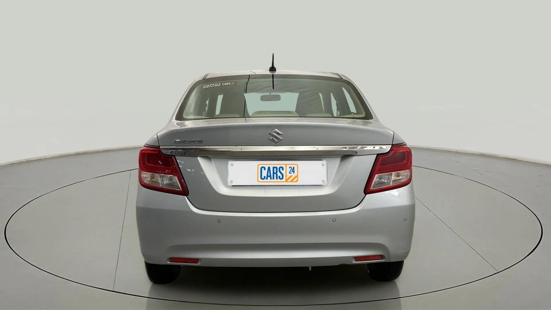 Rear view of a splendid silver Maruti Suzuki Dzire 2018-2023
