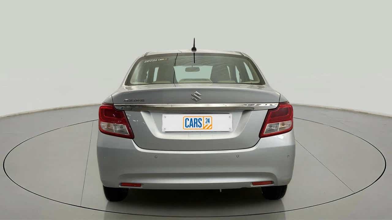 Rear view of a splendid silver Maruti Suzuki Dzire 2018-2023
