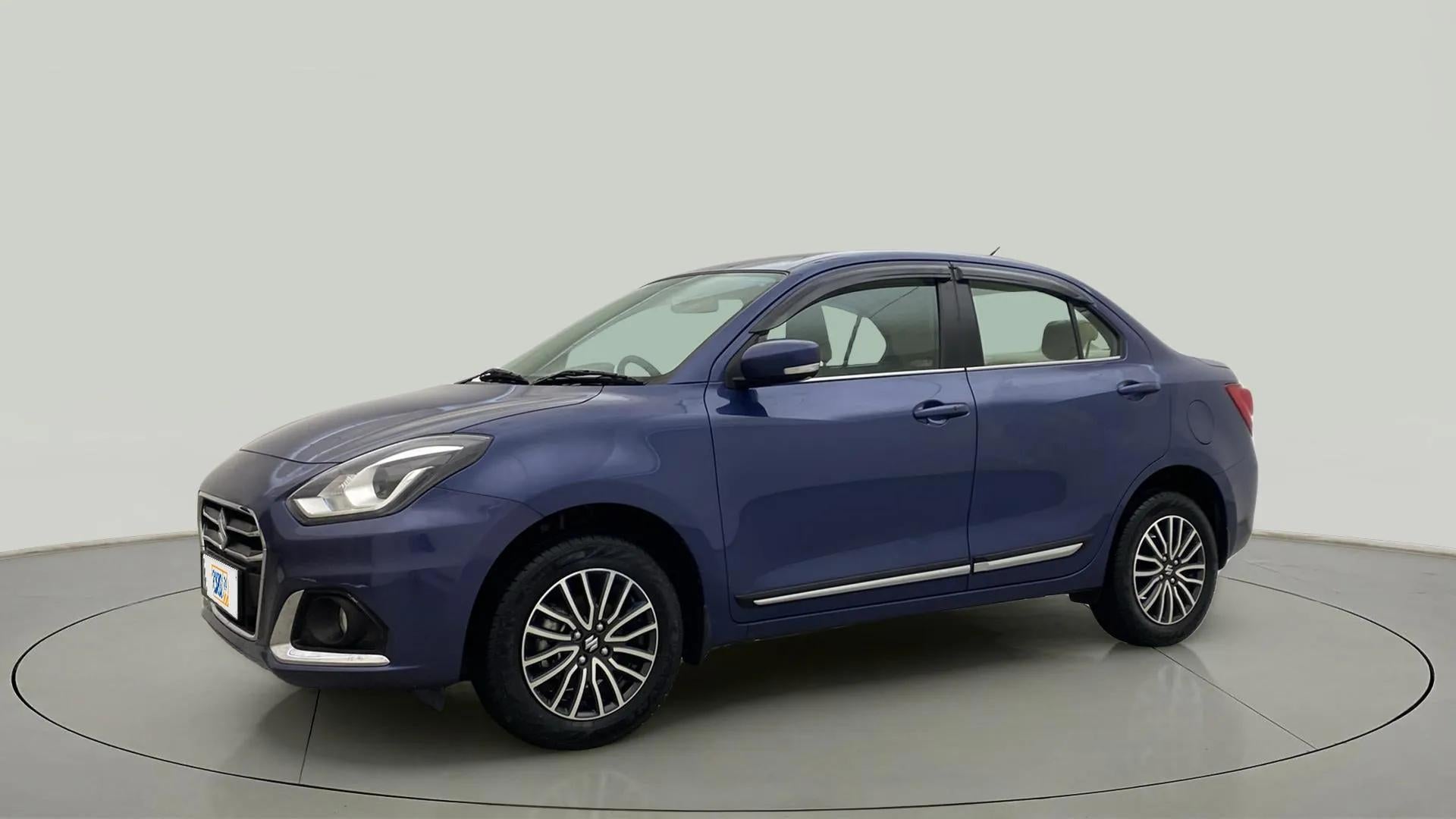 Front three-quarter view of a Alluring Blue Maruti Suzuki Dzire