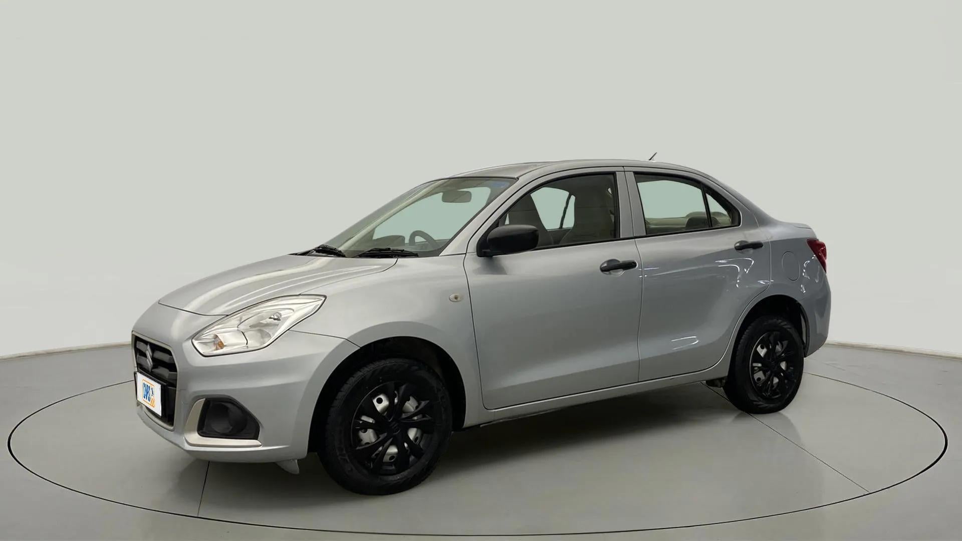 Front side view of a splendid silver Maruti Suzuki Dzire 2018-2023