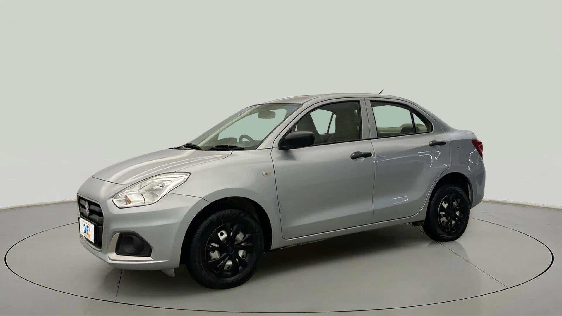 Front side view of a splendid silver Maruti Suzuki Dzire 2018-2023
