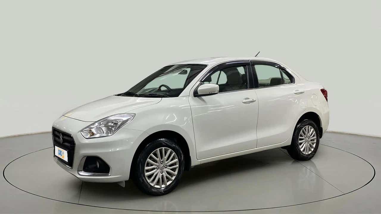 Front three-quarter view of a Arctic White Maruti Suzuki Dzire 2018-2023