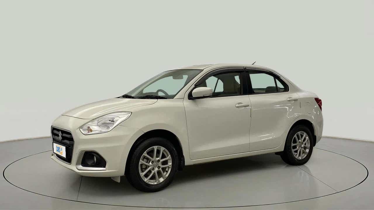 Front three-quarter view of a Pearl Arctic White Maruti Suzuki Dzire