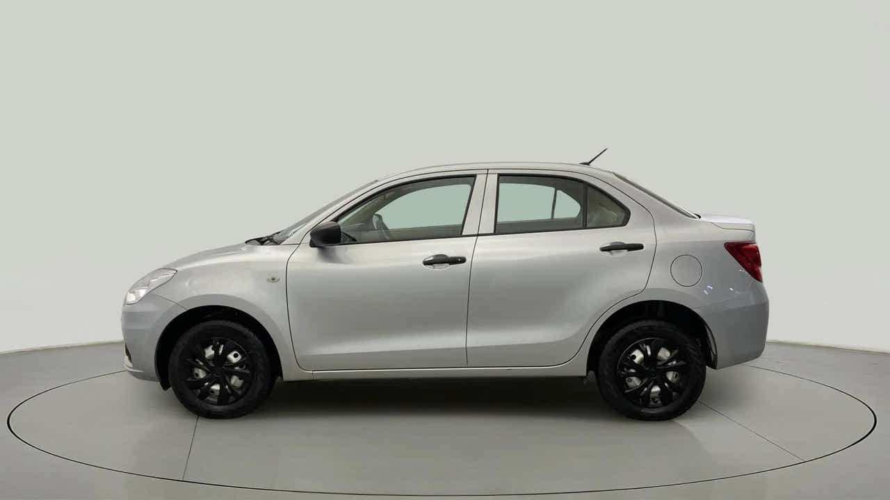 Side view of a splendid silver Maruti Suzuki Dzire 2018-2023