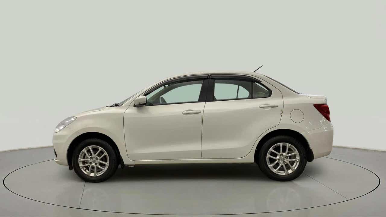 Side view of a Pearl Arctic White Maruti Suzuki Dzire
