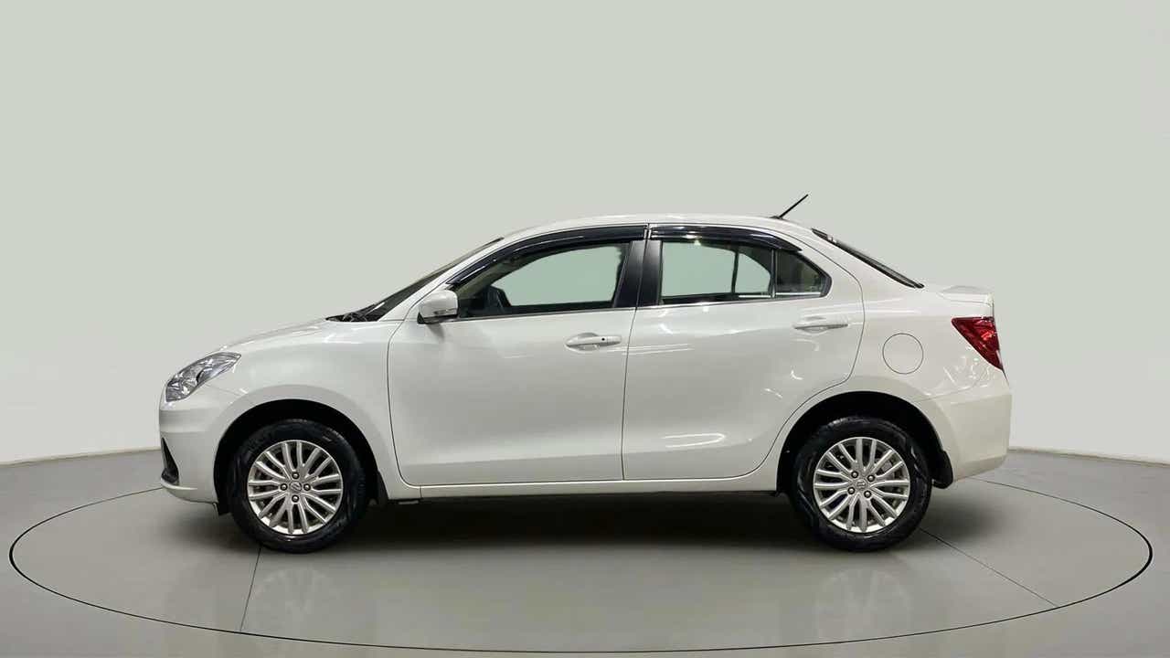 Side view of a Arctic White Maruti Suzuki Dzire 2018-2023