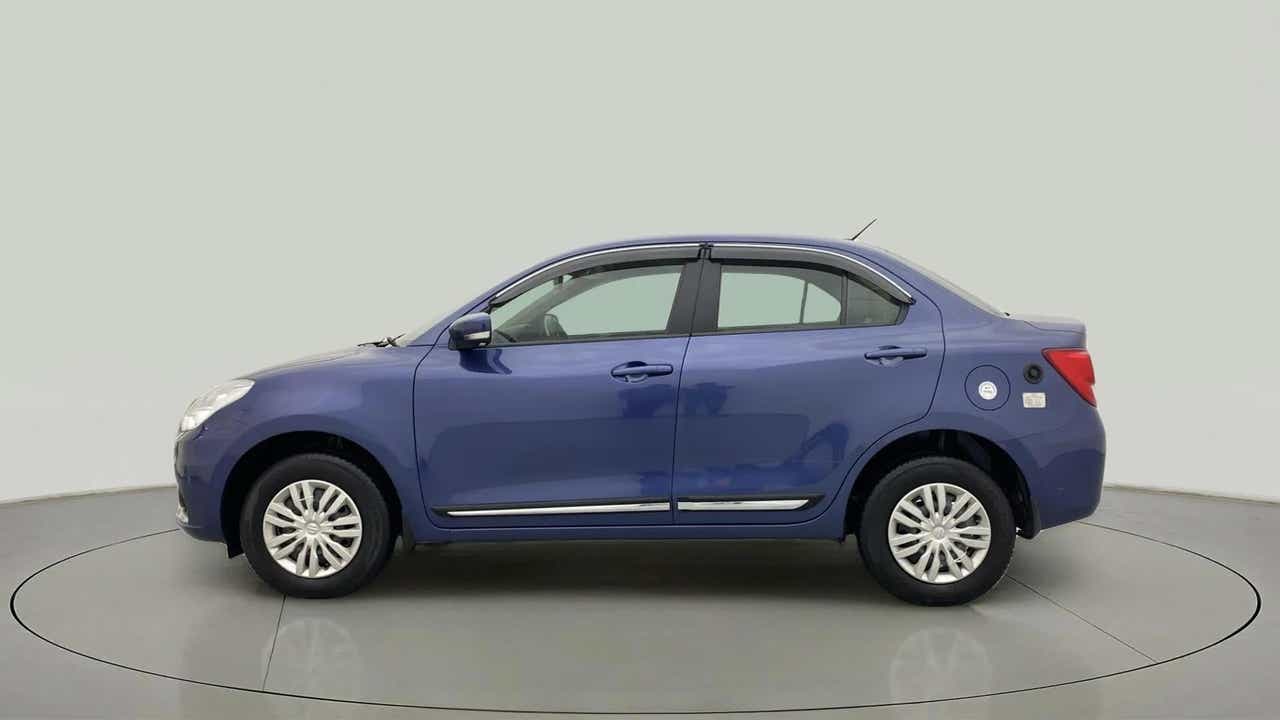 Side view of a oxford blue Maruti Suzuki Dzire 2018-2023