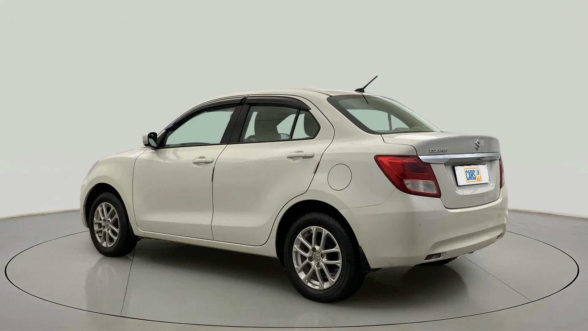 Rear three-quarter of a Maruti Suzuki Dzire