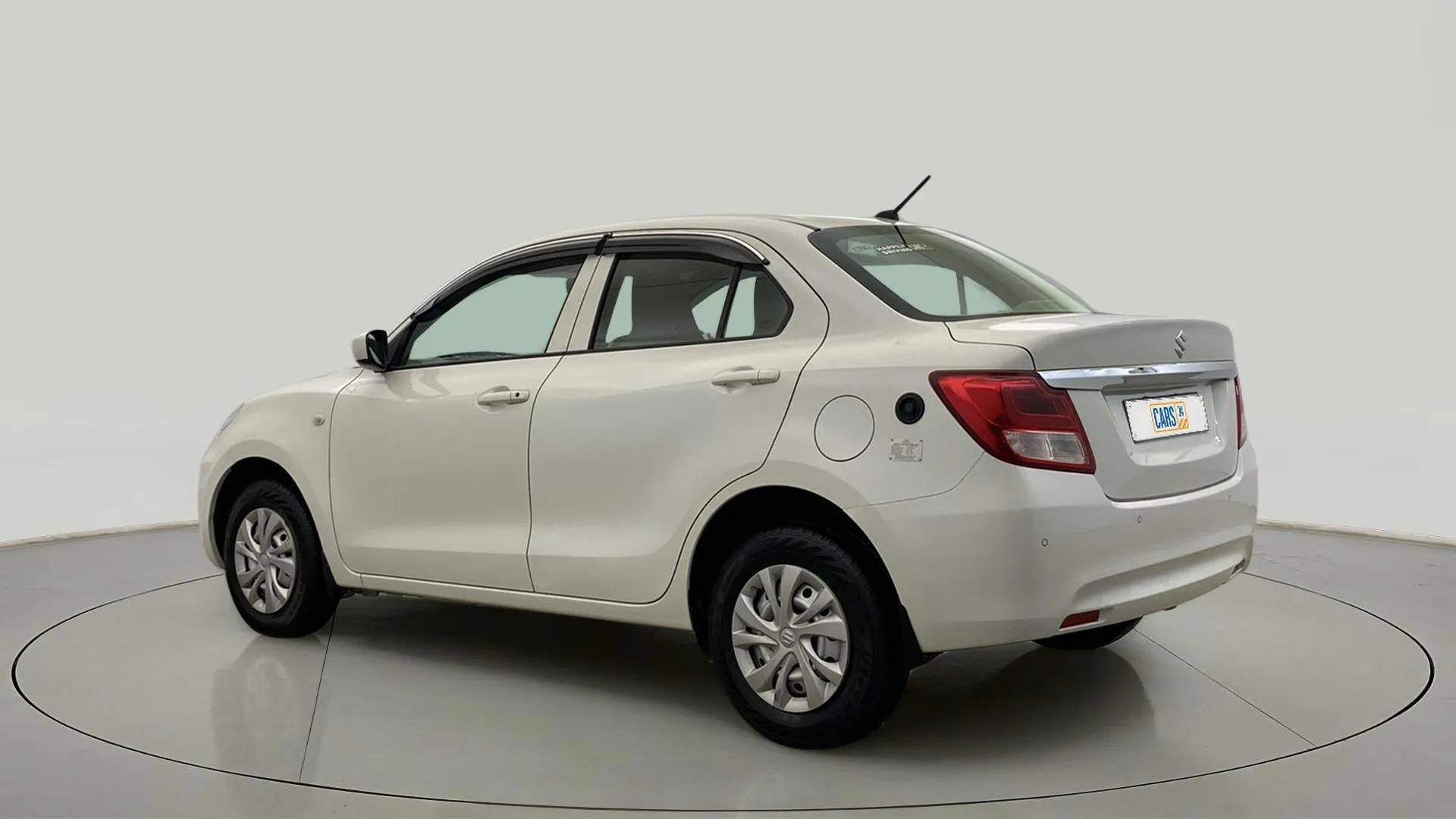 Rear three-quarter of a Maruti Suzuki Dzire