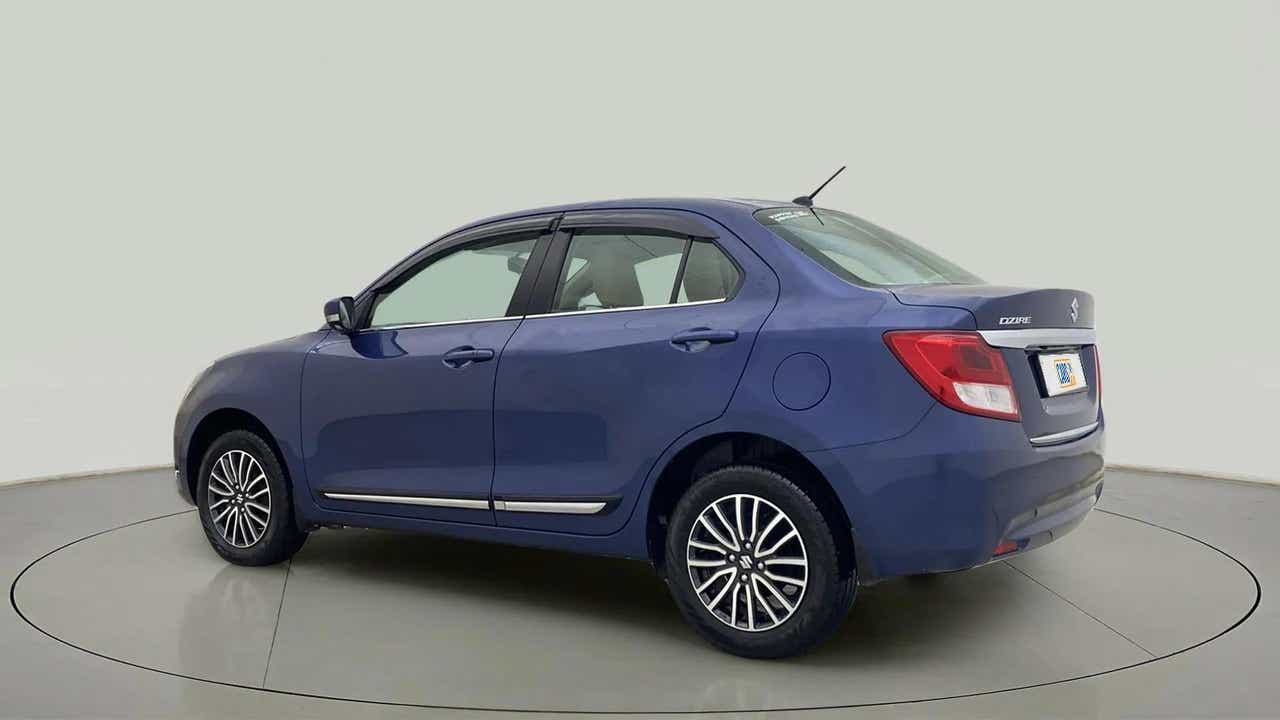 Rear three-quarter view of a Alluring Blue Maruti Suzuki Dzire
