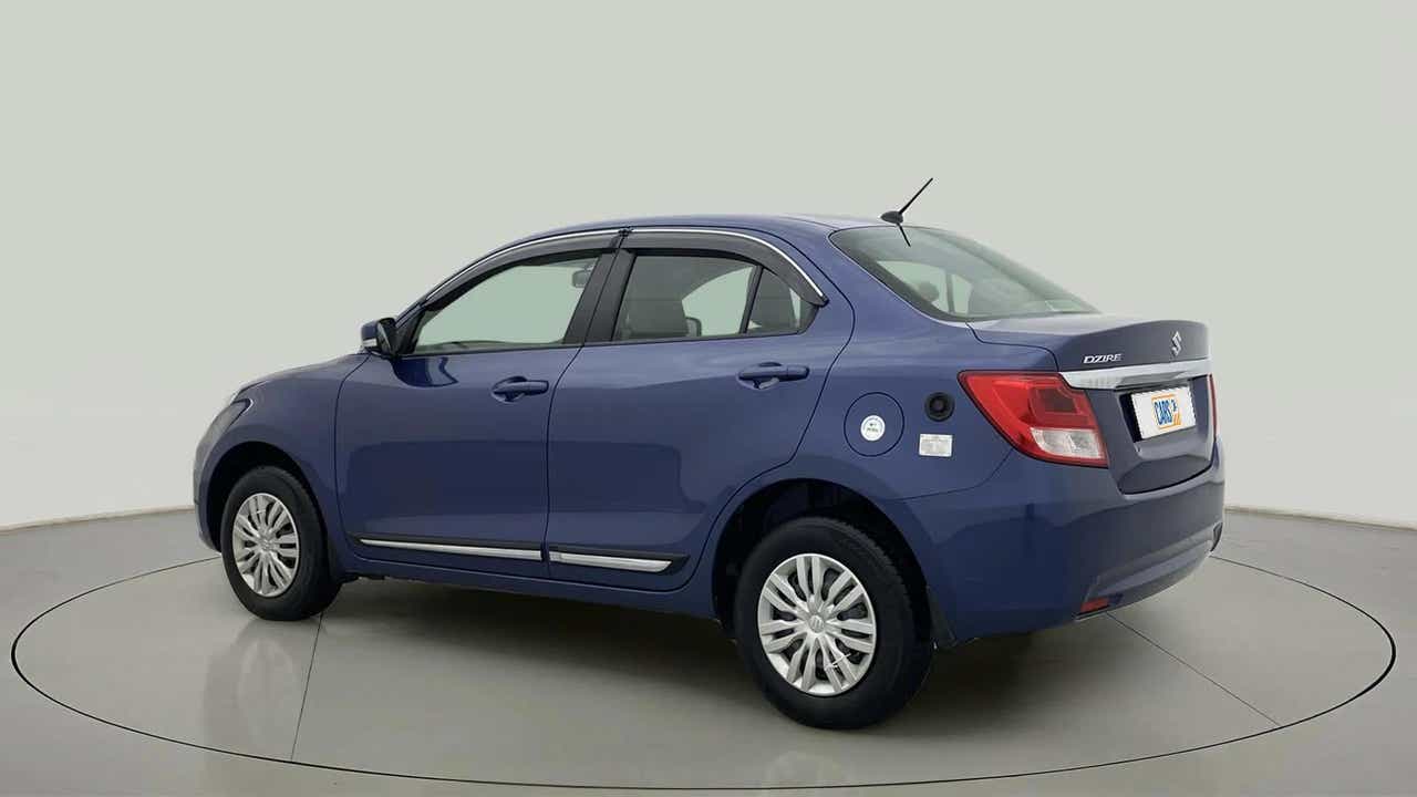 Rear three-quarter of a Maruti Suzuki Dzire 2018-2023