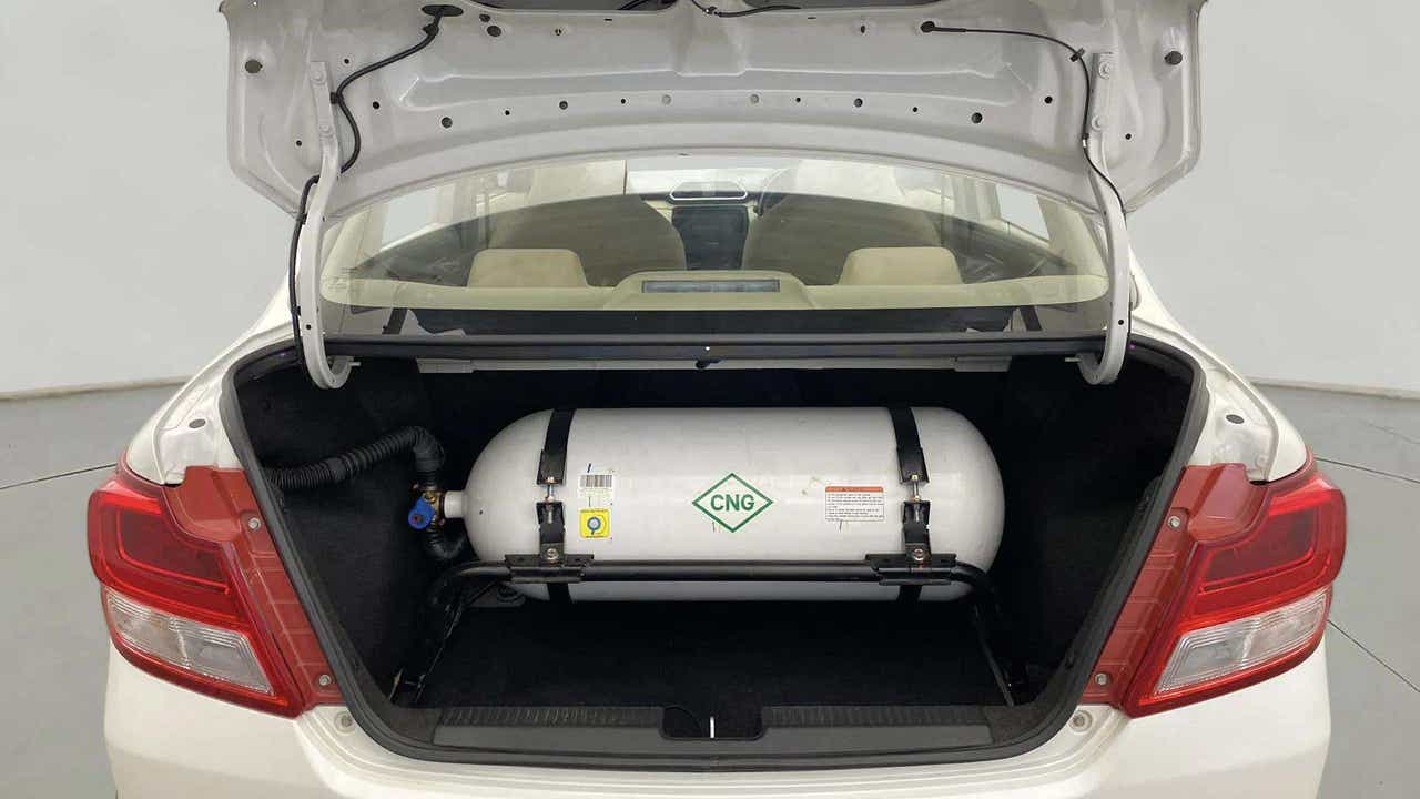 Cng cylinder in the trunk of a Maruti Suzuki Dzire