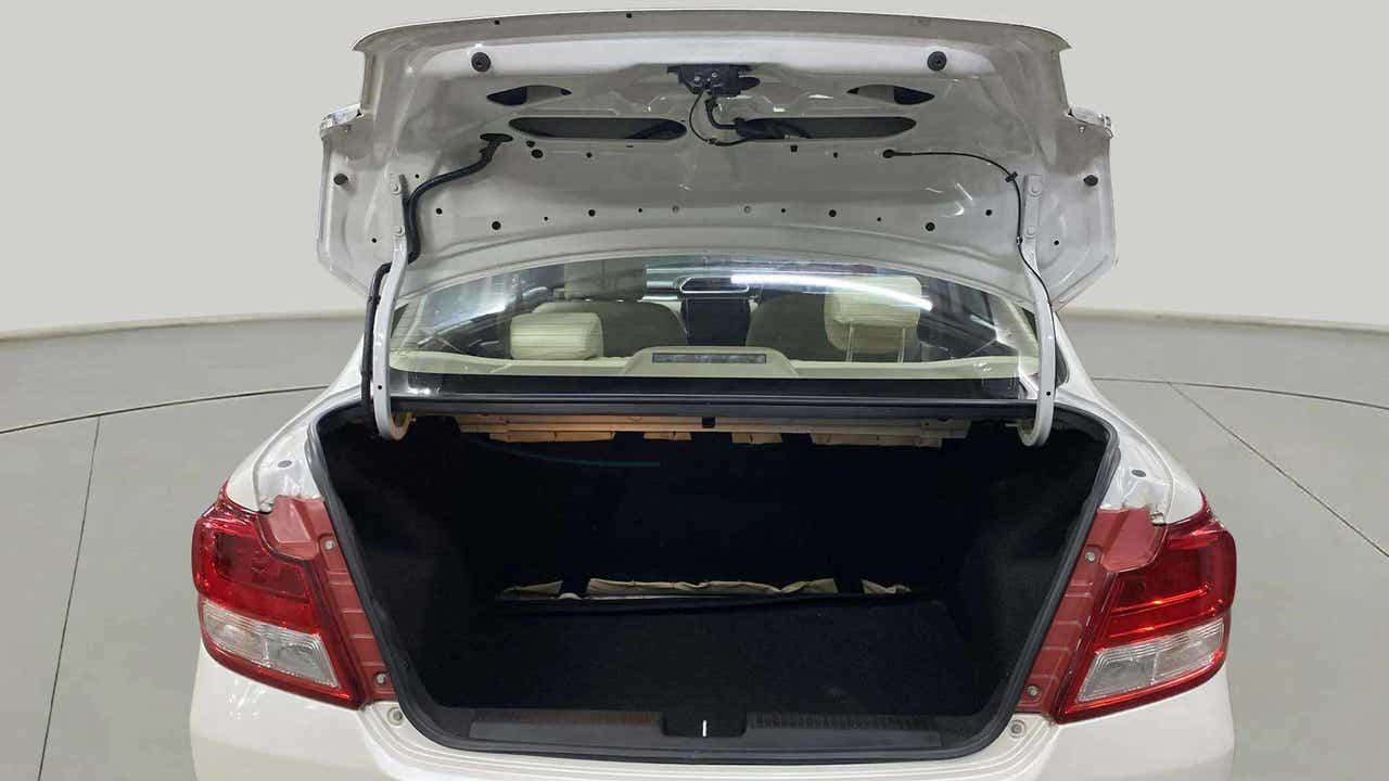 Open boot view of a arctic white Maruti Suzuki Dzire 2018-2023