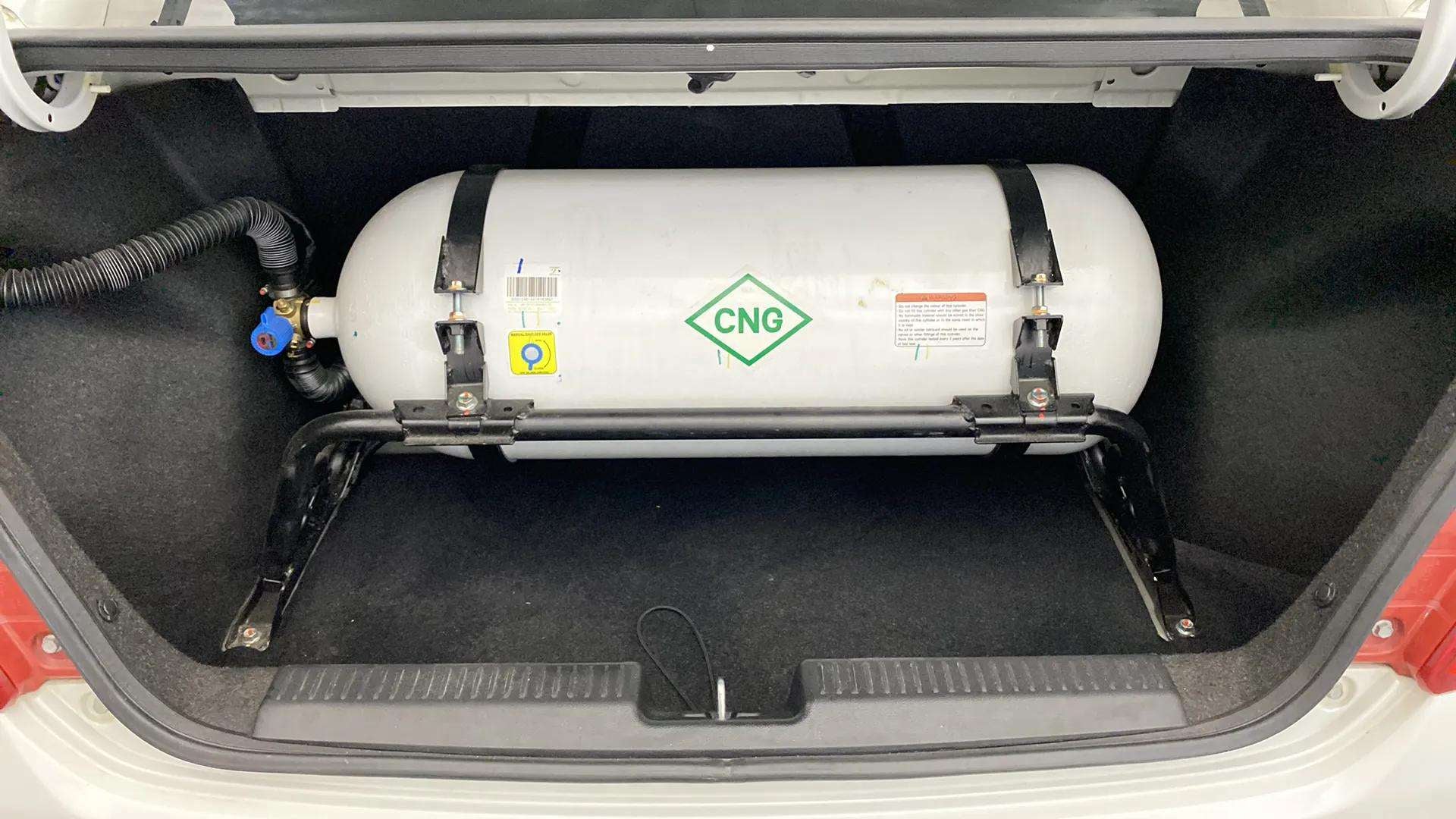 Cng cylinder in the trunk of a Maruti Suzuki Dzire